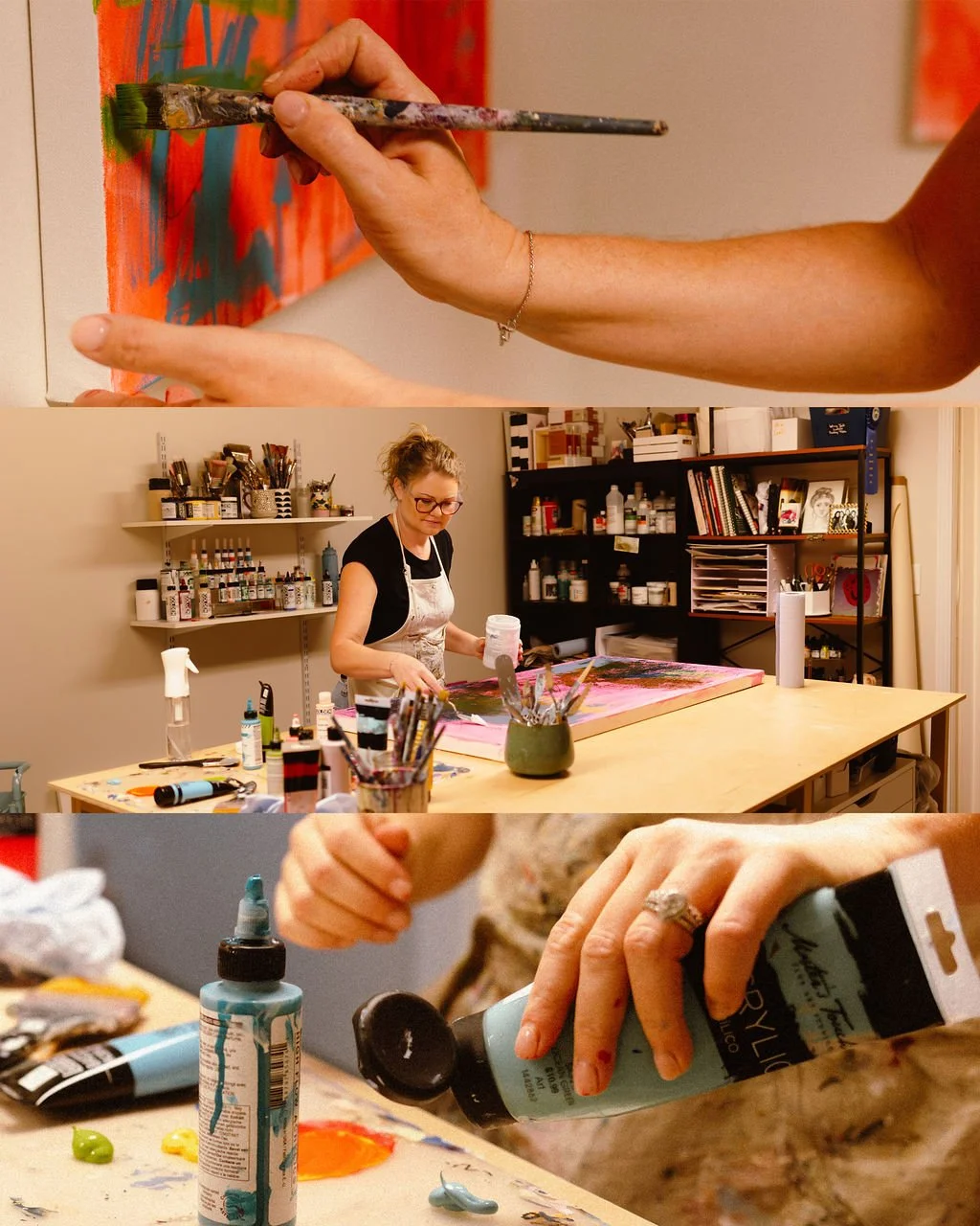 Artist working in a studio painting on canvas.