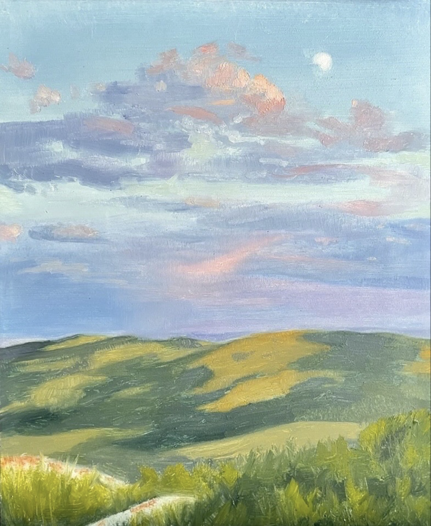 A colorful landscape painting of rolling green hills under a sky with clouds and the moon.
