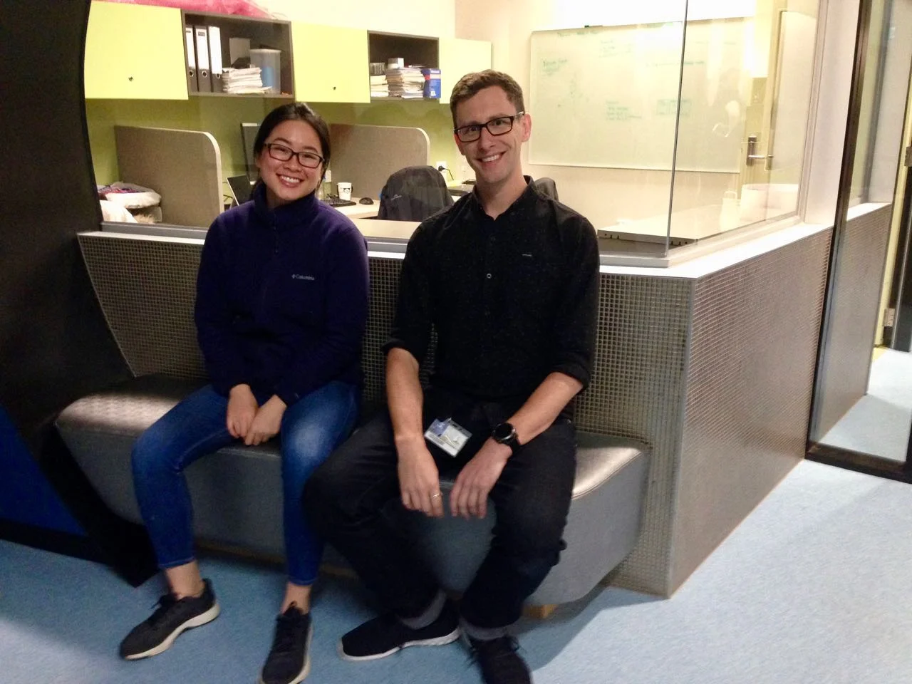 Hanbo and Calum relax on a new seat in the entrance