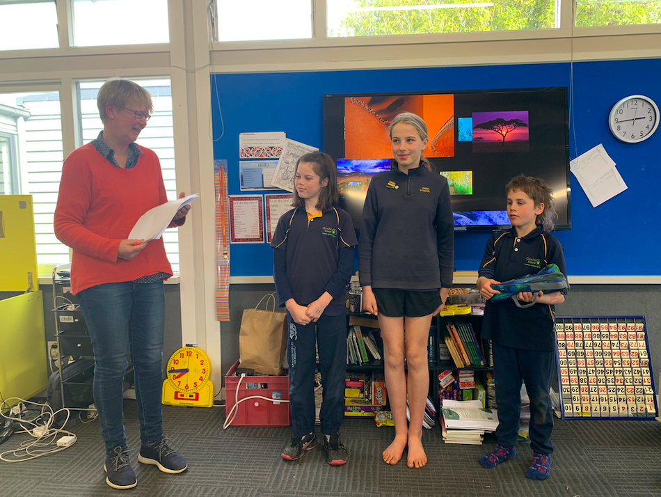 Yo presenting our speech prize winners - 1st Maggie, 2nd Sylvia, 3rd Charlie