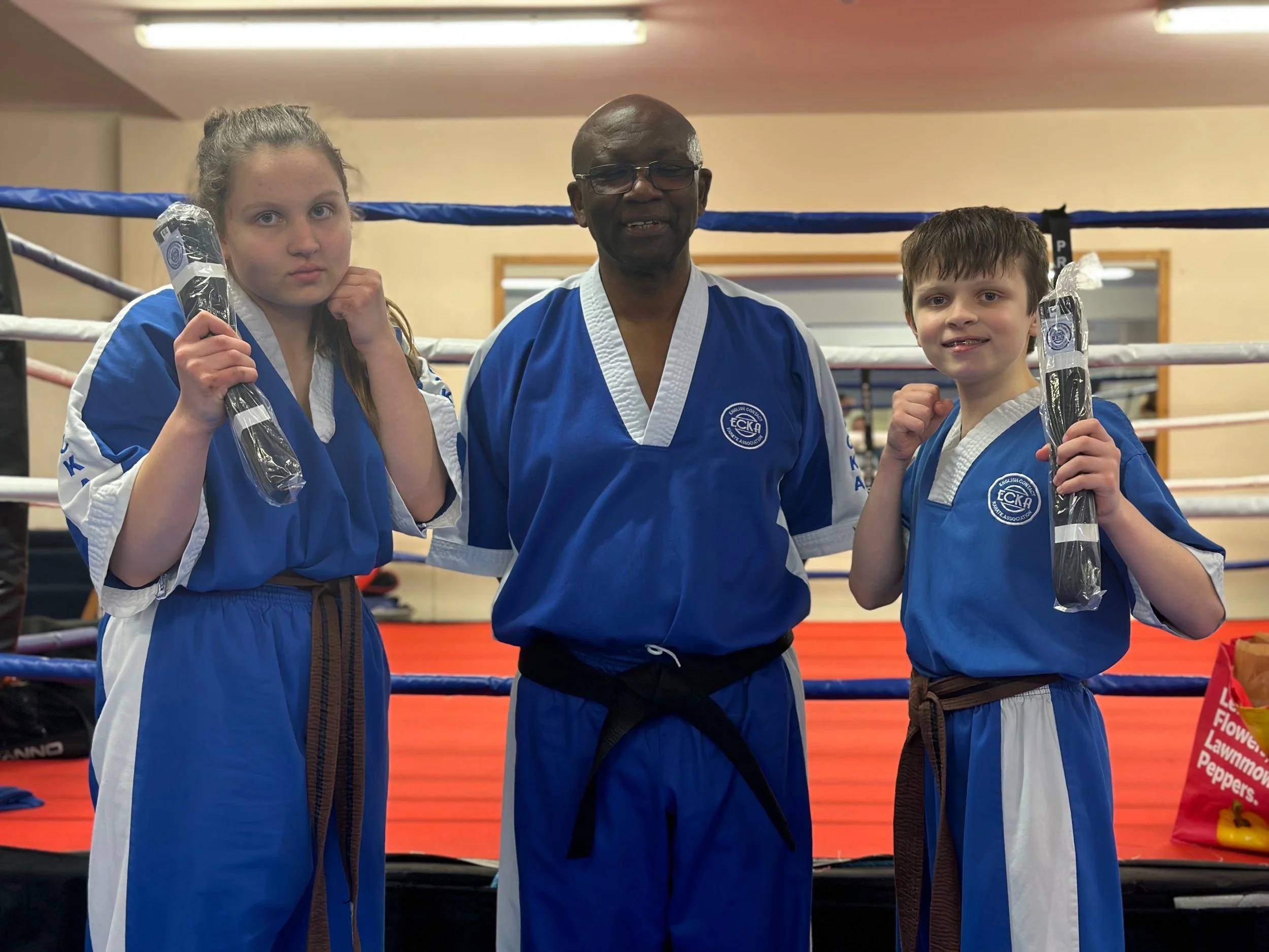 Lizzie and Tommy achieve ECKA black belts