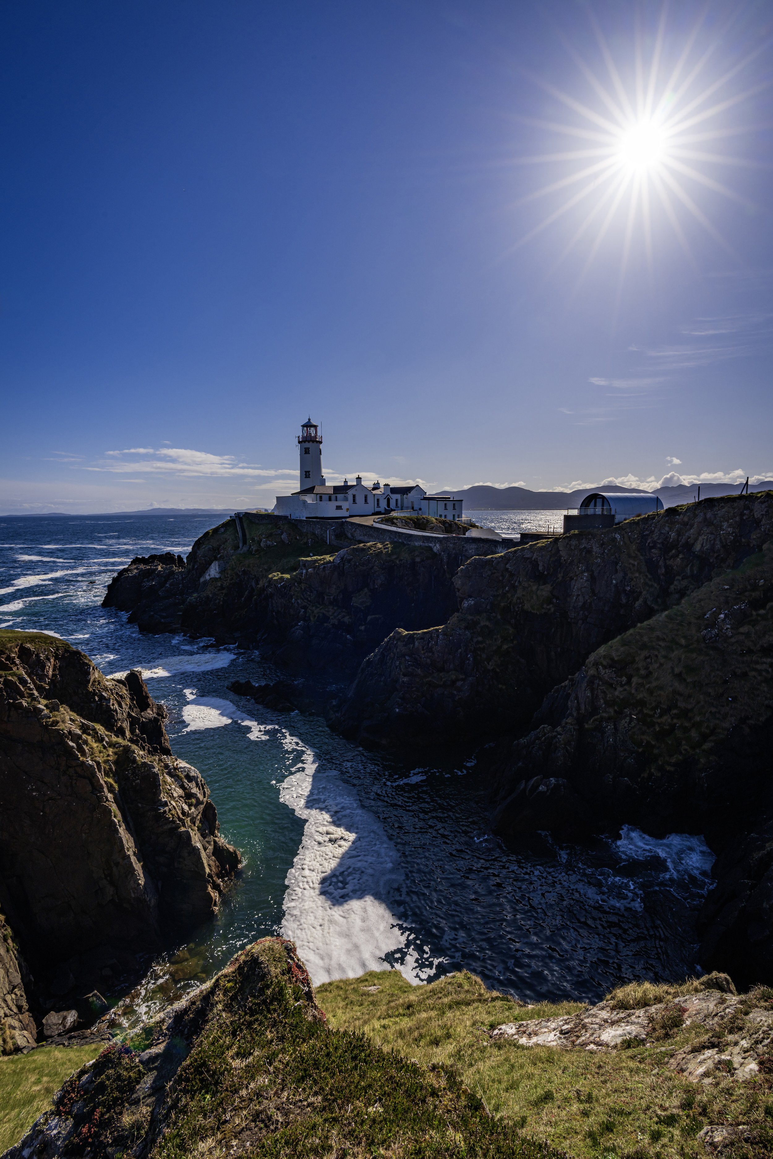 Fanad Head Lighthouse with sunburst
