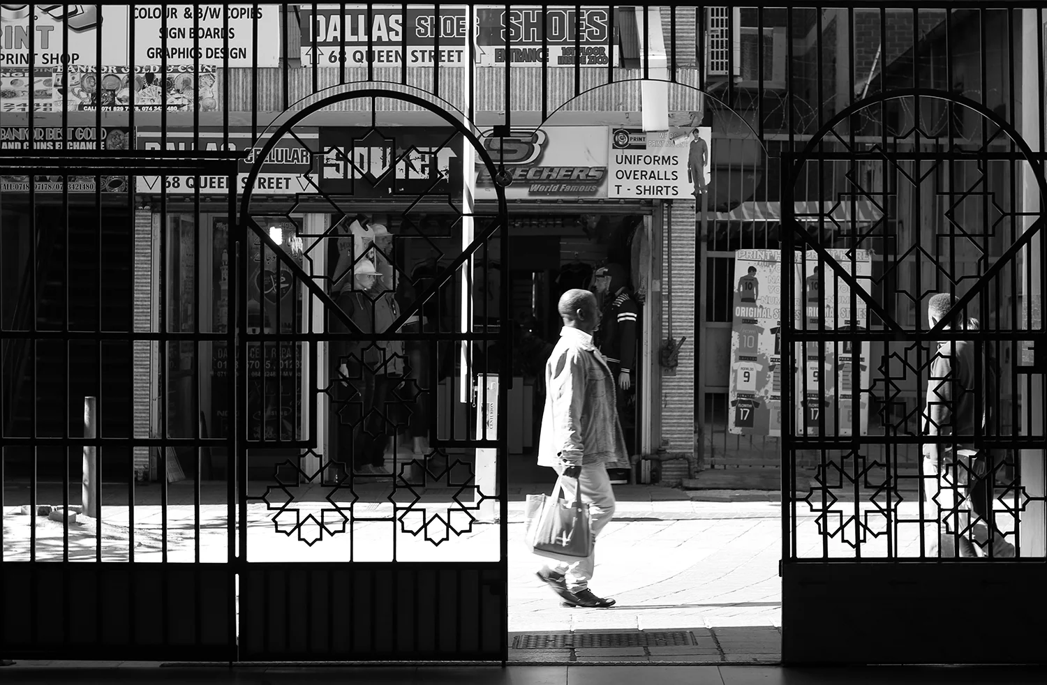 Man through gate