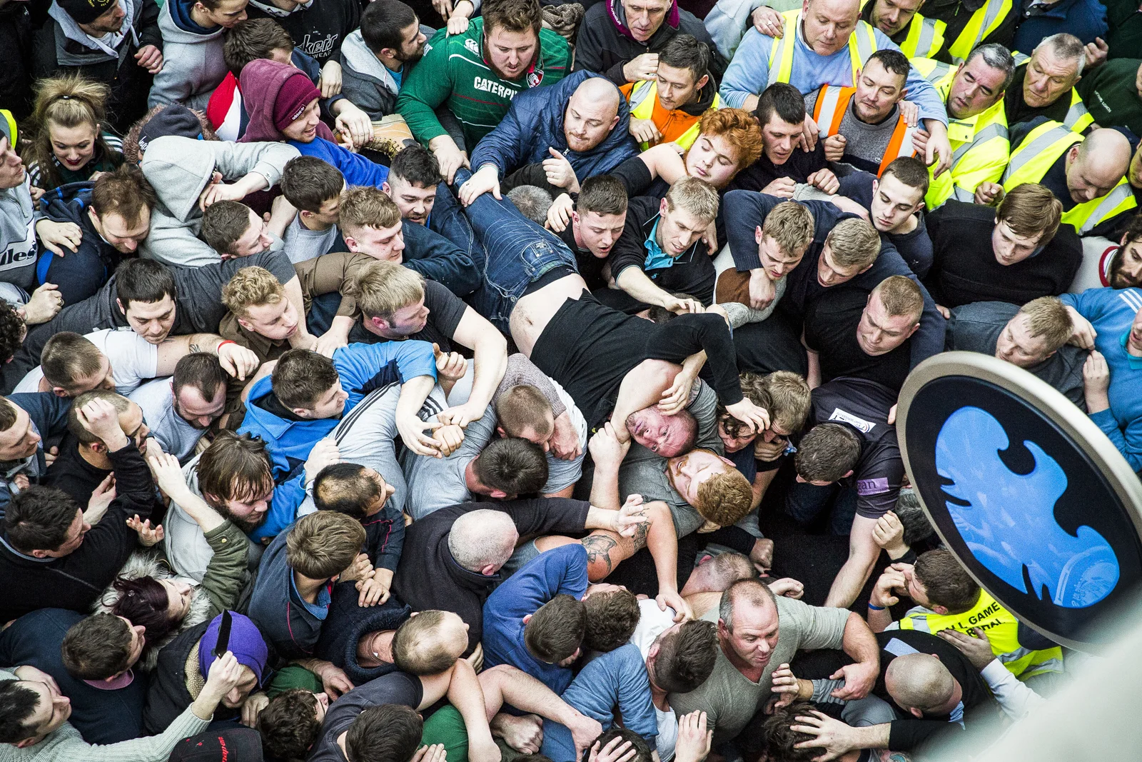 The Atherstone ball game forms a huge scrum outside a bank in Atherstone town centre, Warwickshire