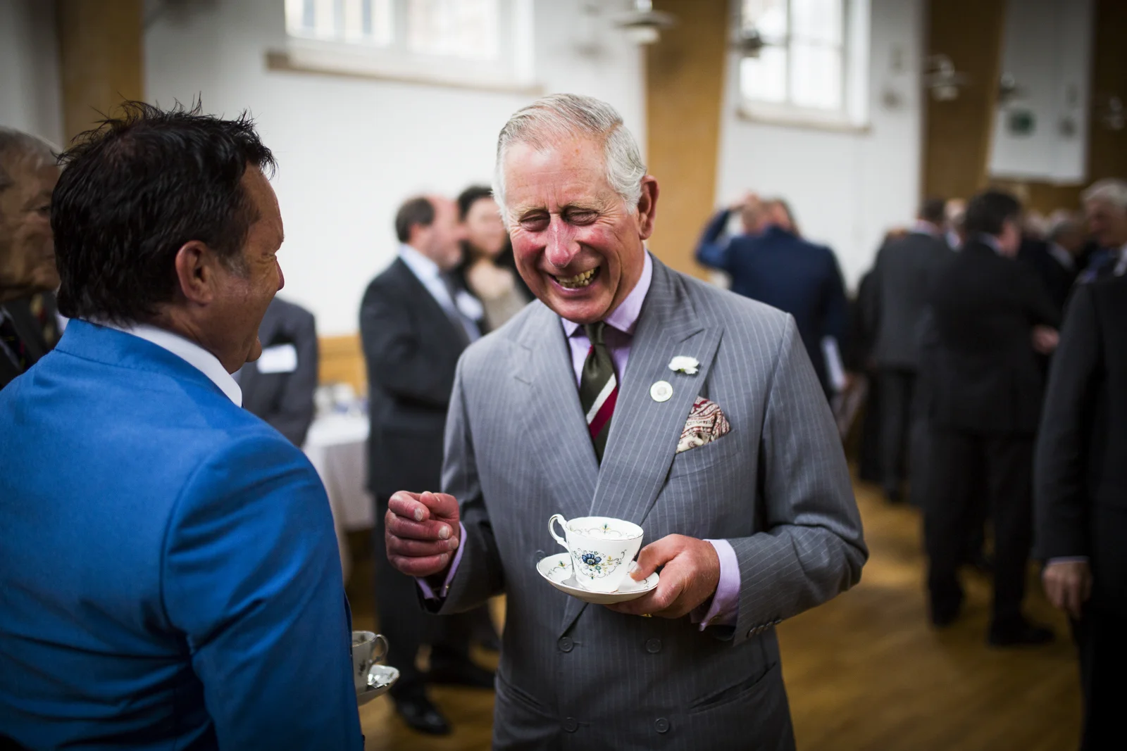 Prince Charles is greeted by members of the local community at St Marys Church in Abergavenny, Wales