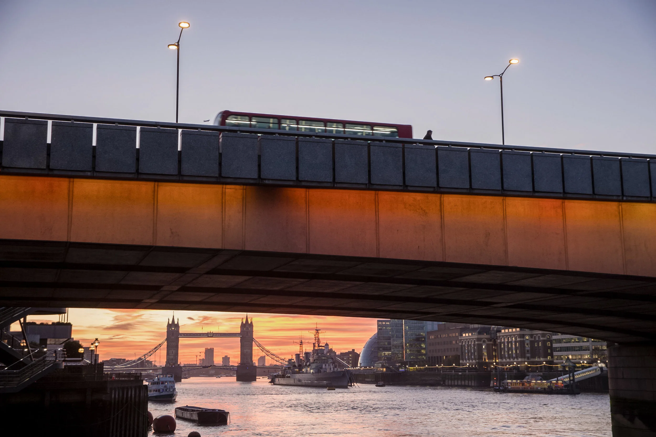 Sunrise behind Tower Bridge in London