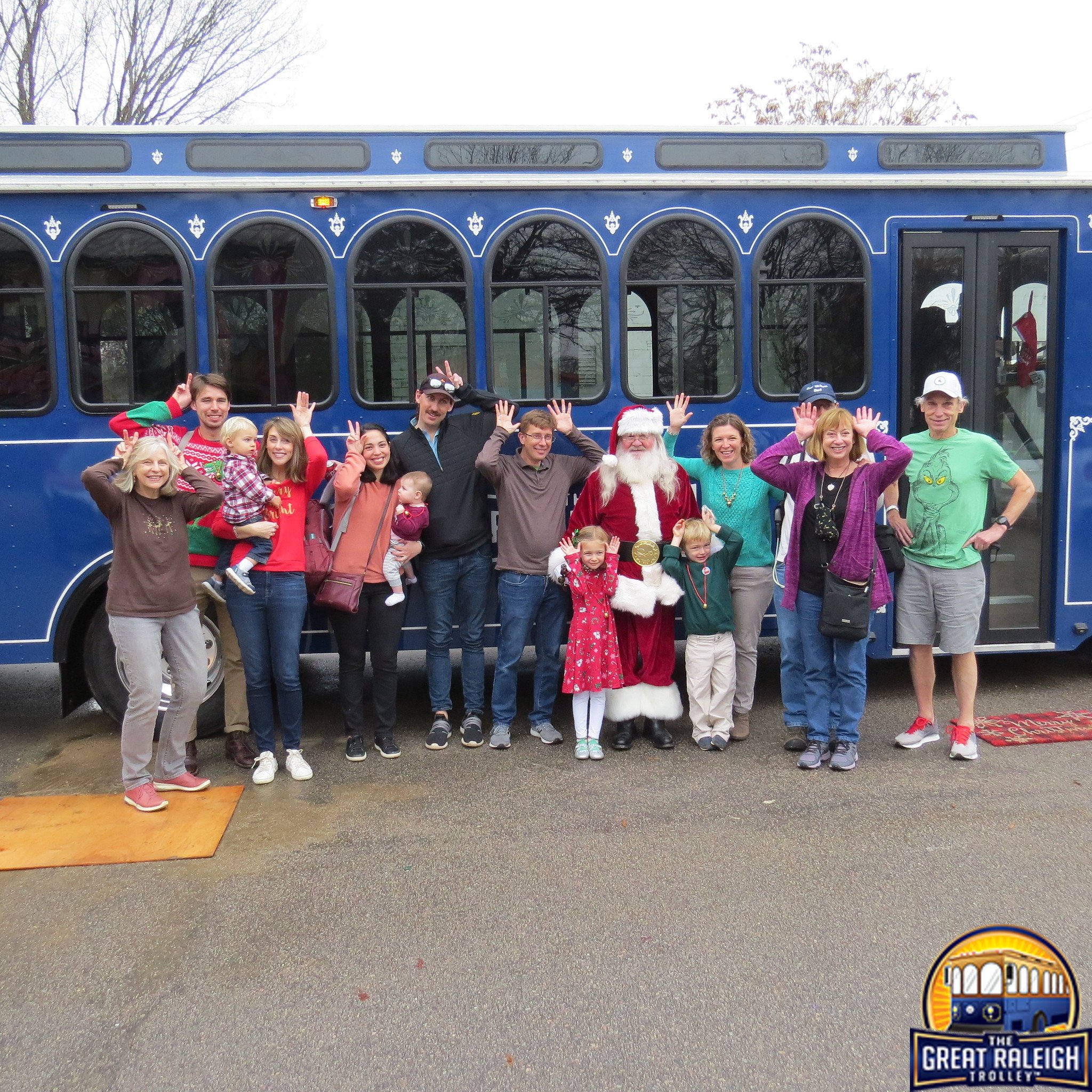 Santa in front of Trolley.jpg