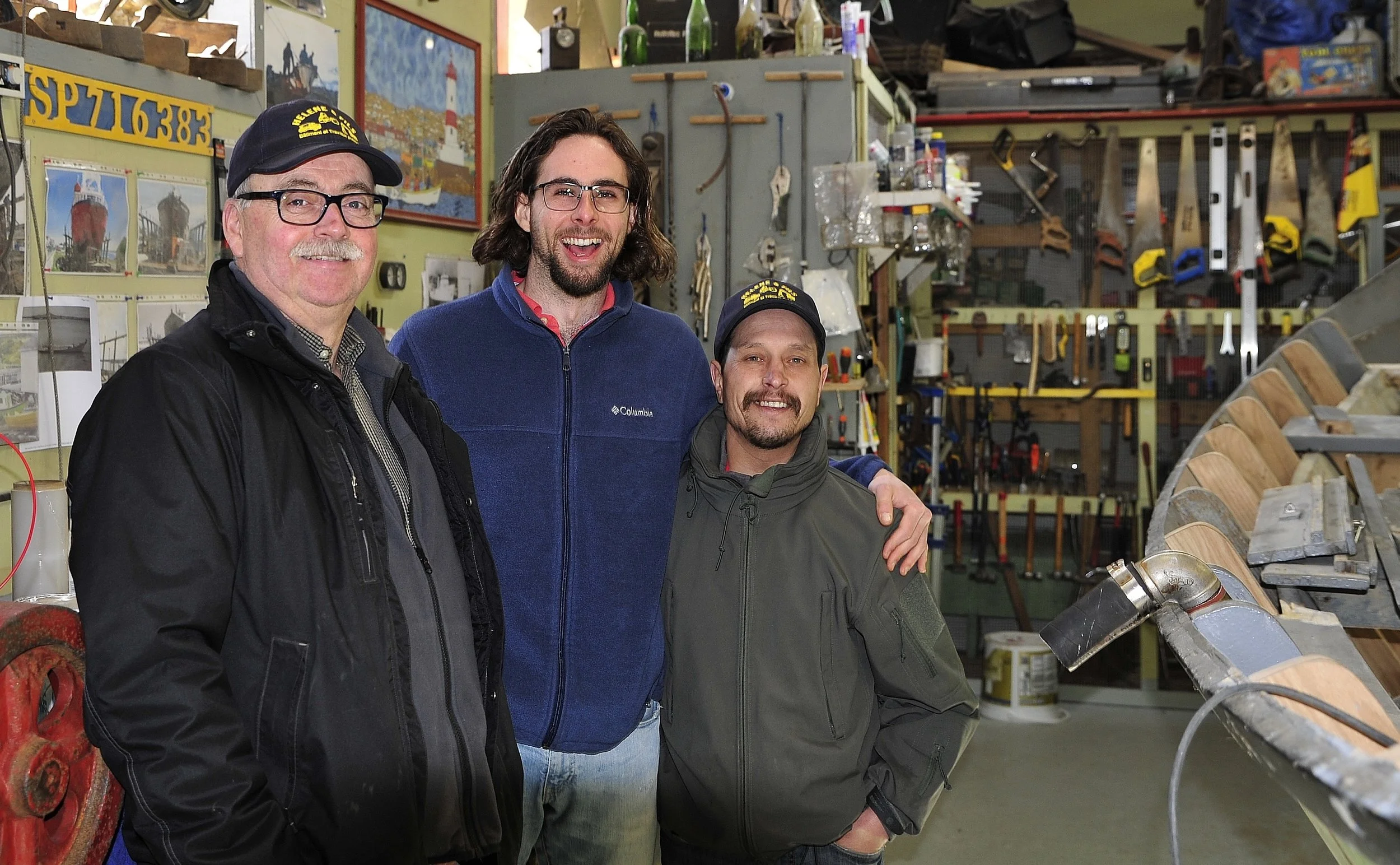   The Zigotos craftsmen and a Dory under restoration  
