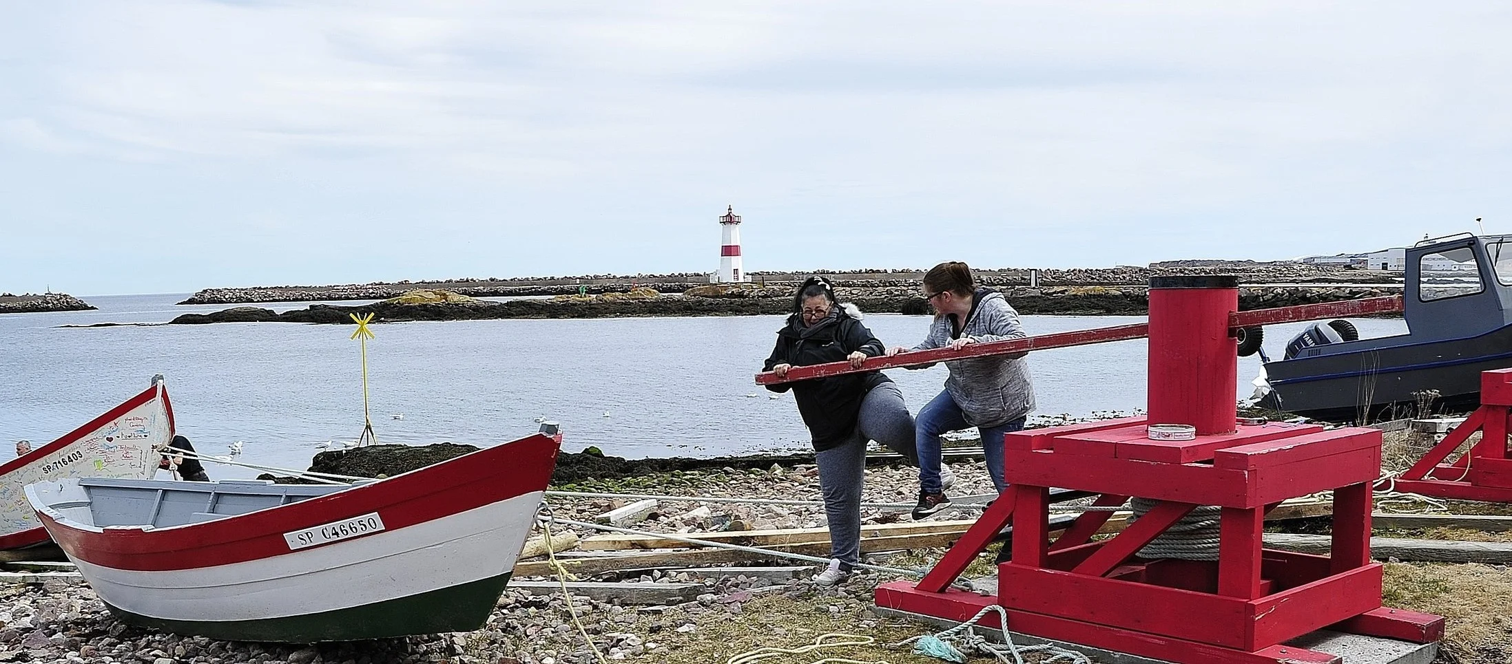   Working the ropes to launch the Dory  