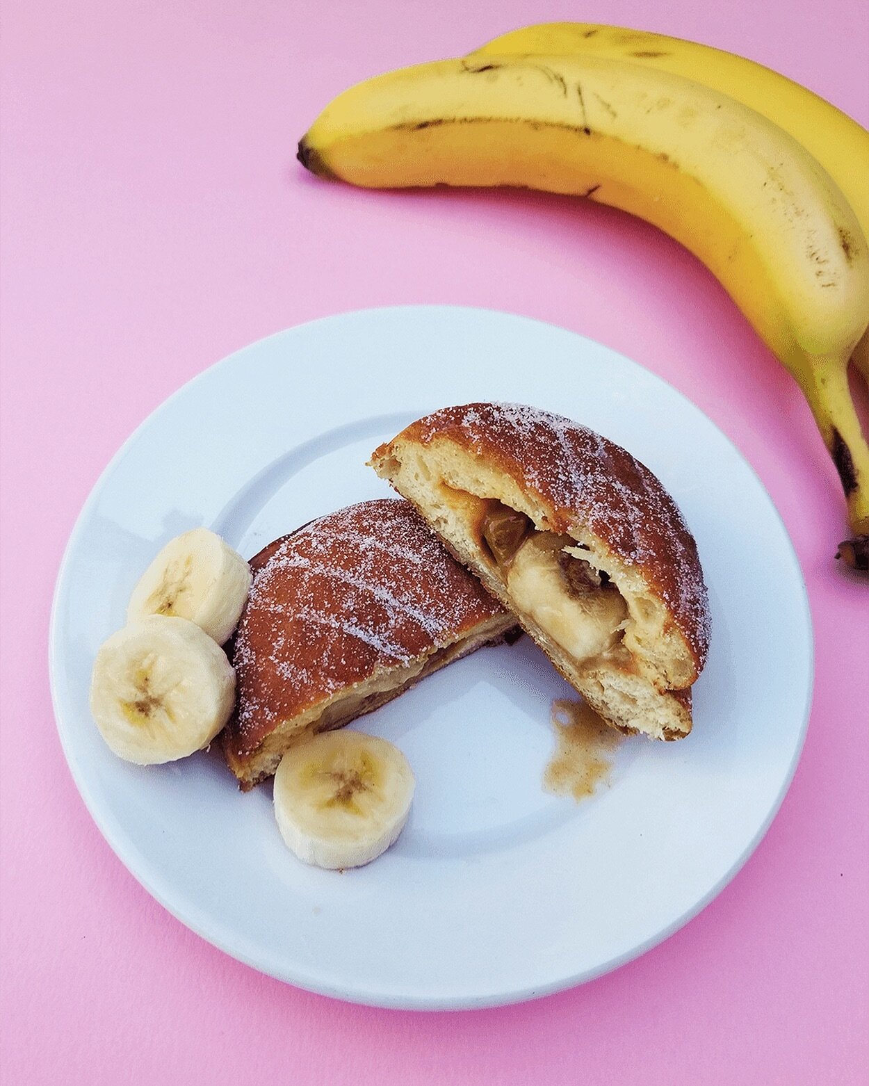 Banana de Leche Filled is on the menu this week! This is a customer favorite 🤩 

🍌 Dulce de leche &amp; fresh banana sliced in our filled dough. Topped with a sugar.