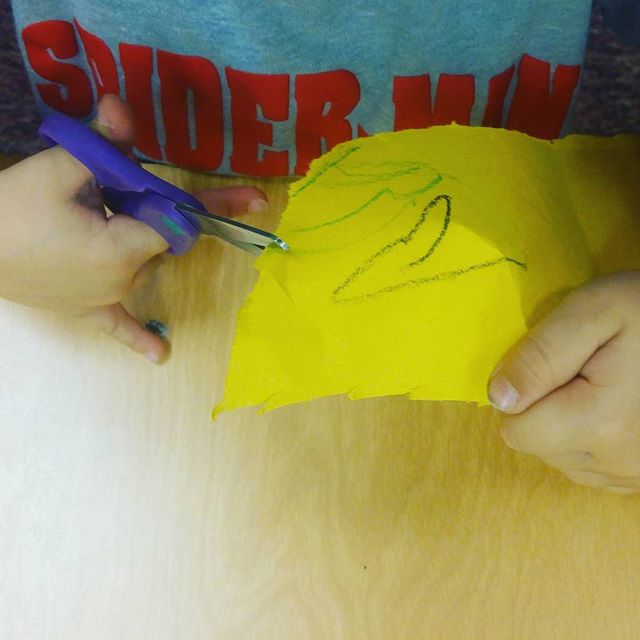 Learning to cut is SO fun! Look at these tiny hands working so hard to develop the fine motor skills that lead to learning to write. #preschool #finemotorskills #toddler #sandiego #learningtowrite #socal #sdbaby #baby #babiesofig #toddlersofig