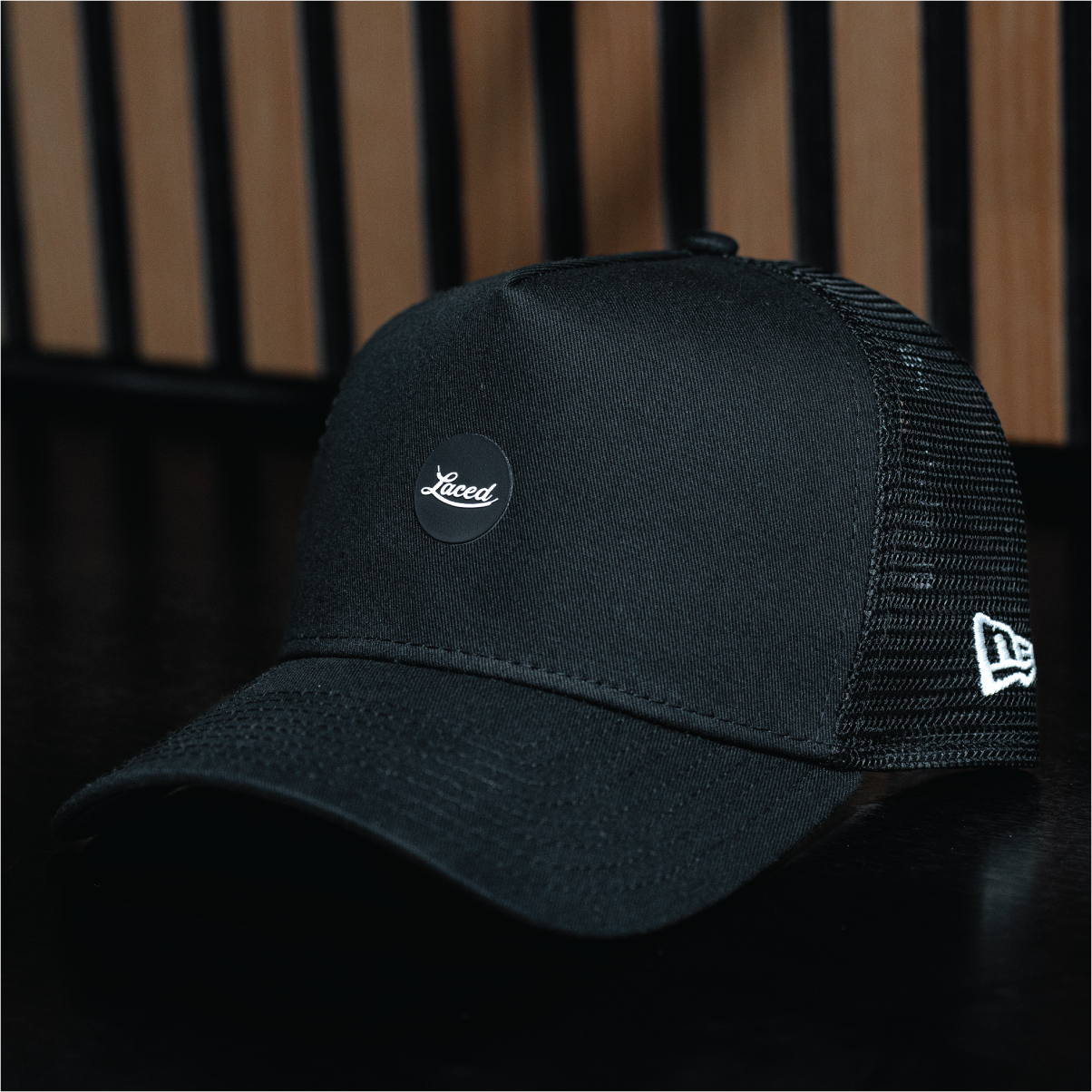 black stamped new era lid.png
