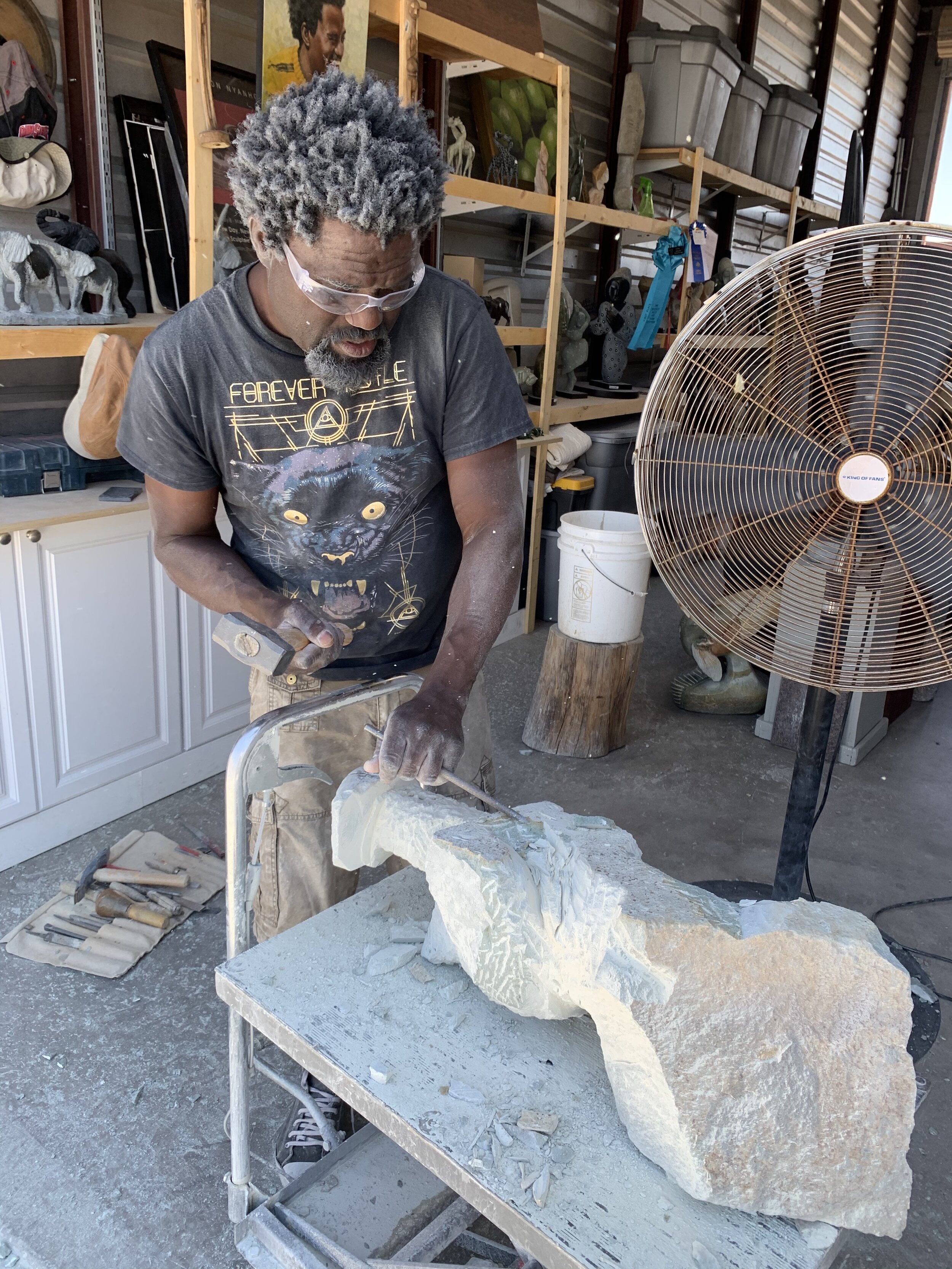 Sculpting in his Studio in heat of the Arizona Desert