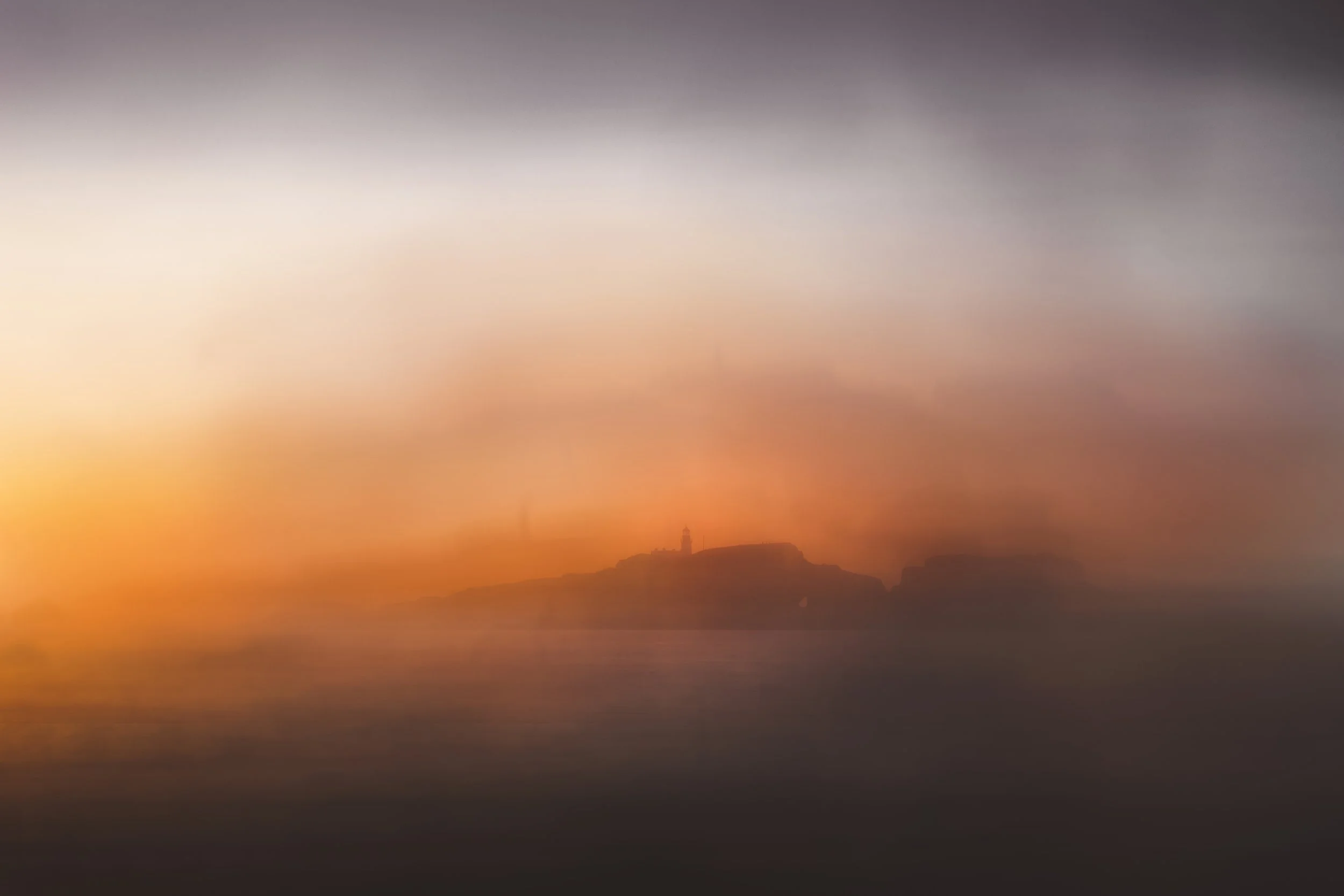 Fidra in Haar at sunset