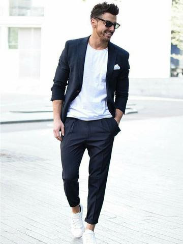 suit with t shirt and trainers