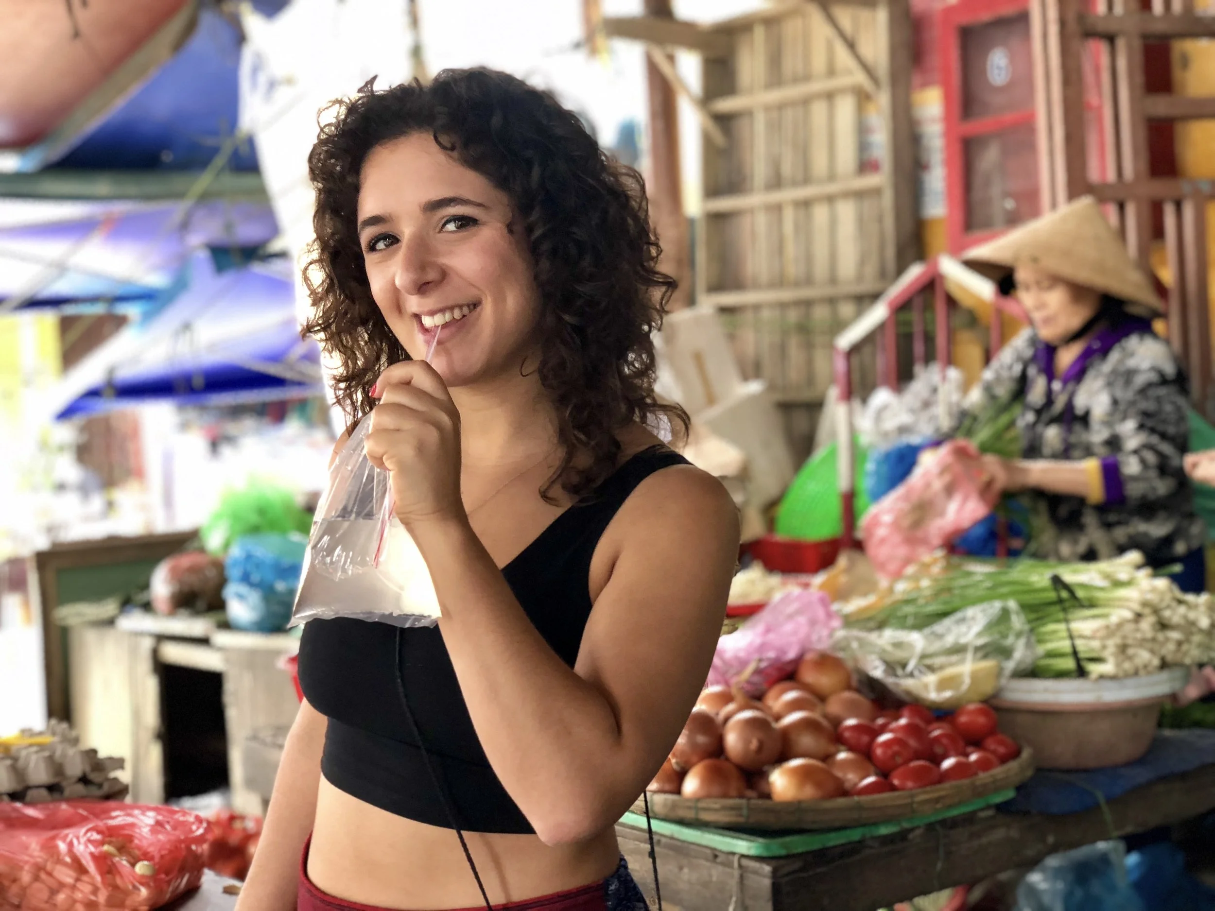 Sipping on freshly cracked coconut water for a whopping $0.20.