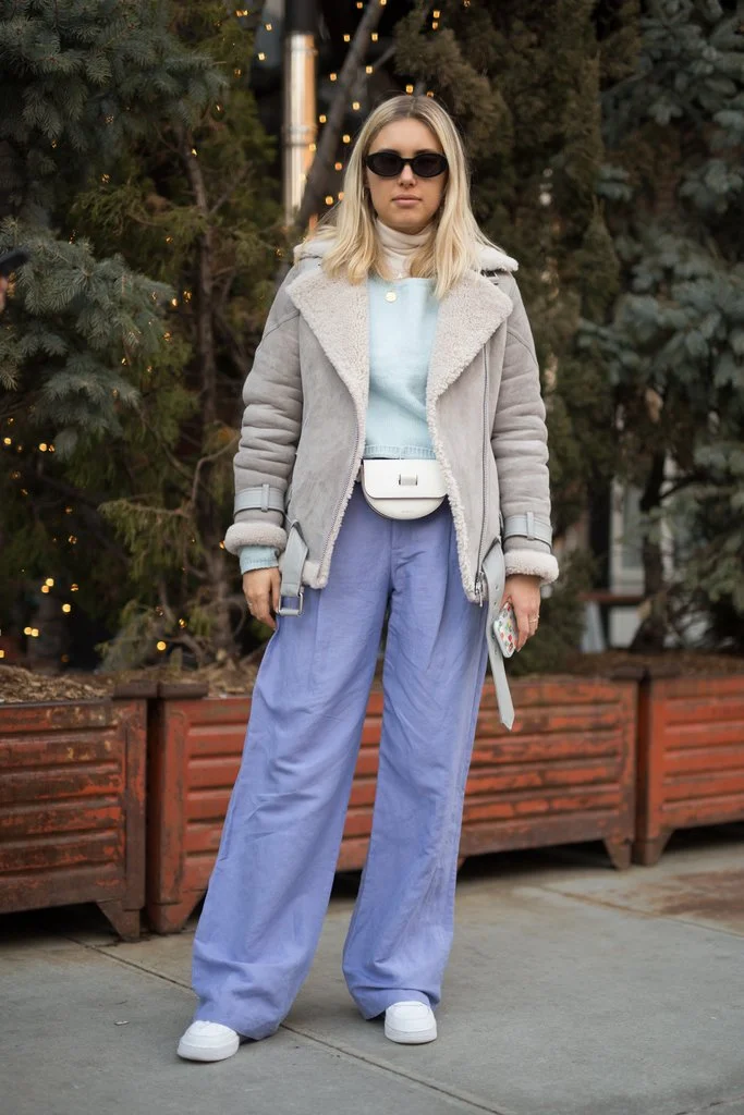Ground multiple pastel hues with neutrals like a sand-colored jacket and white accessories.