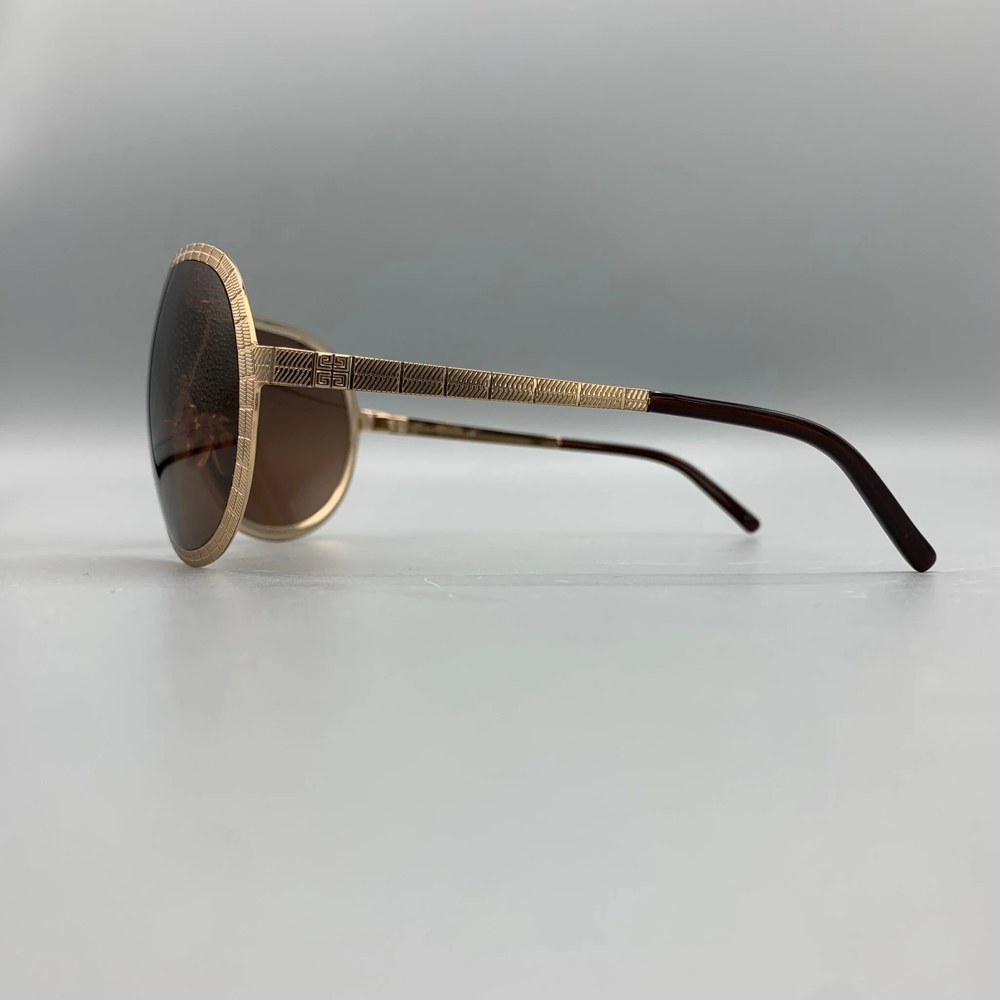 gold shield sunglasses