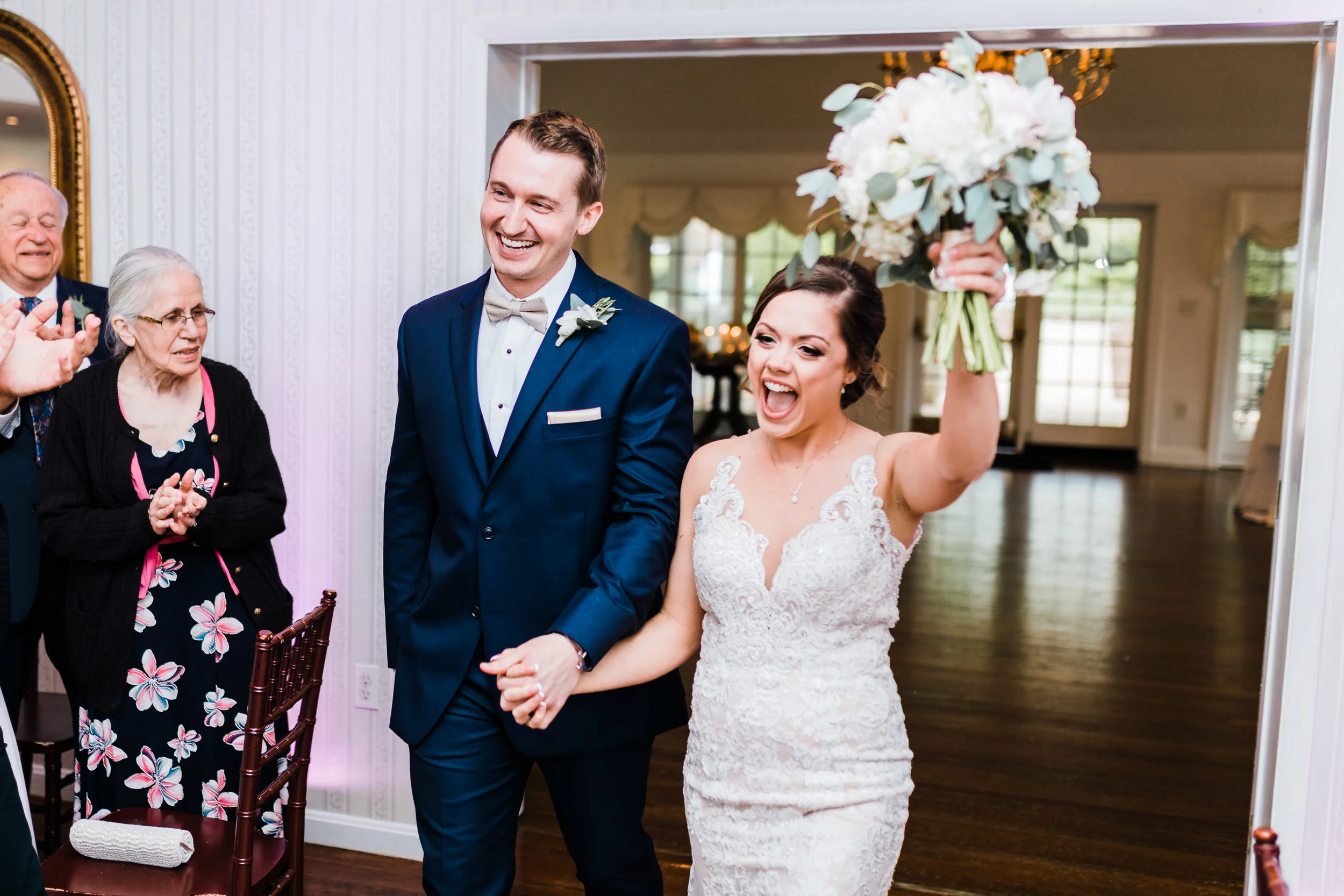 bride and groom excited to come in to their wedding at antrim 1844 - maryland wedding photography