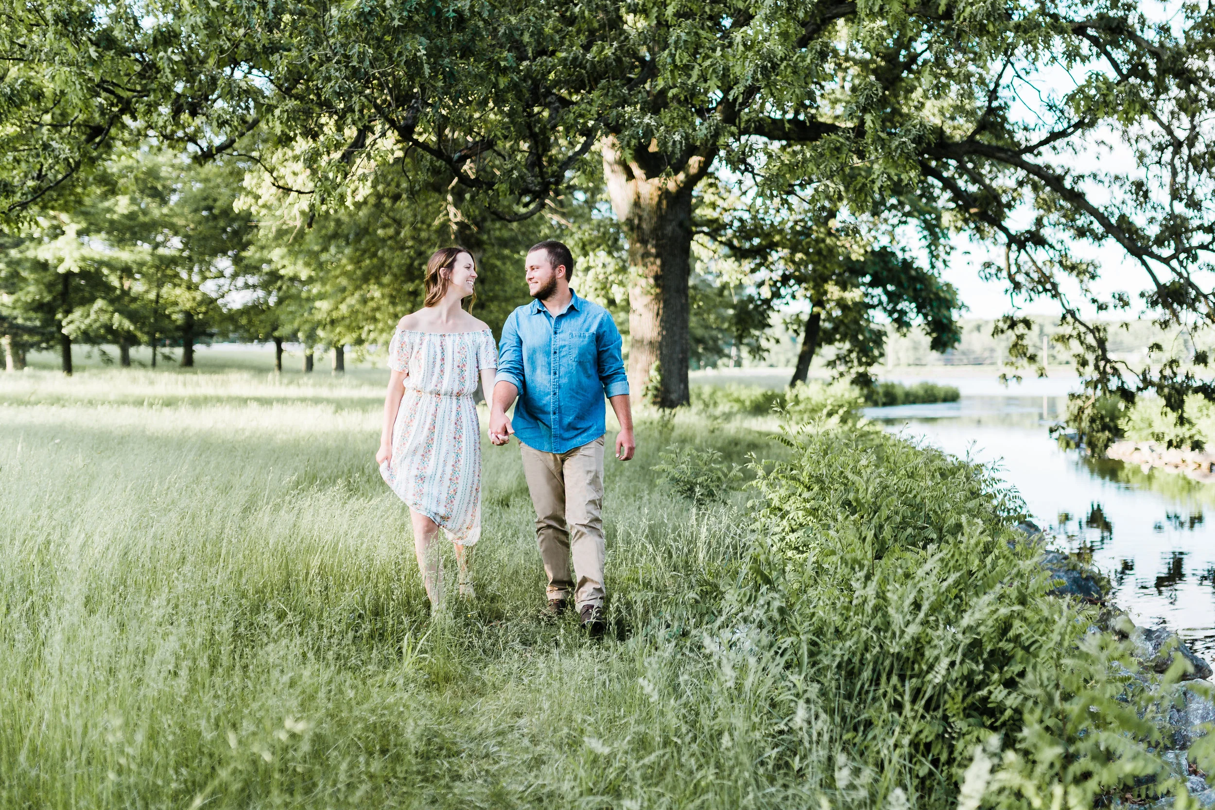 maryland engagement photographer - couple holding hands and walking
