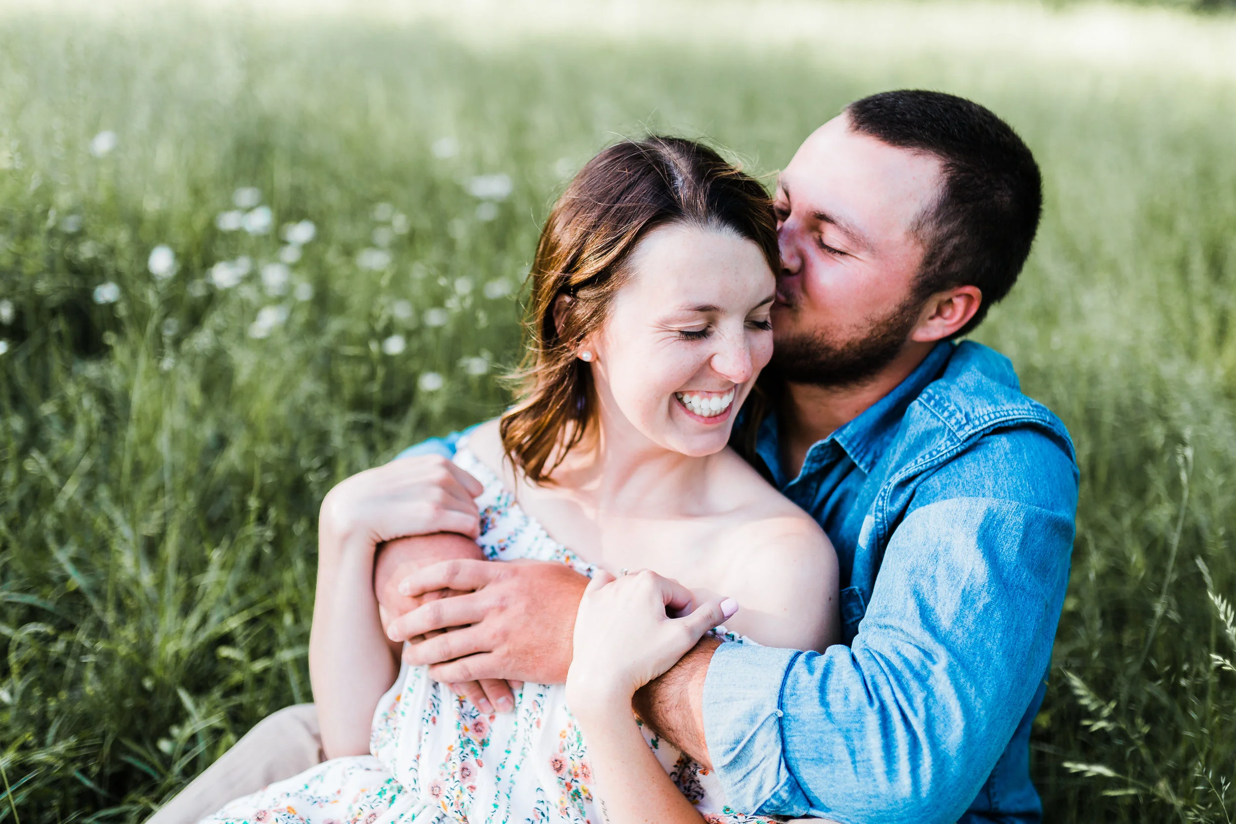 groom hugging his bride at maryland engagement session - md engagement photographer