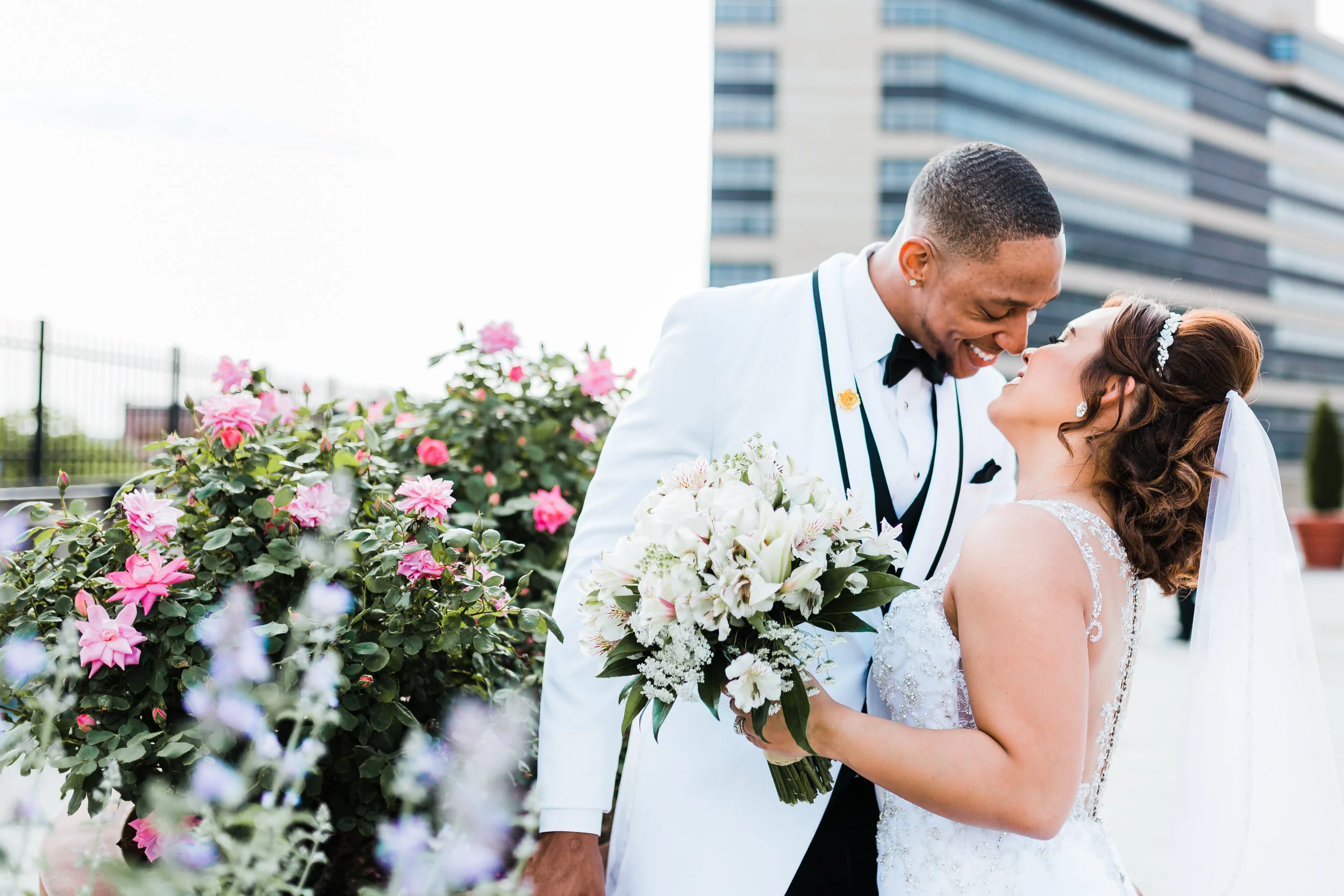 baltimore couple snuggling on their wedding day