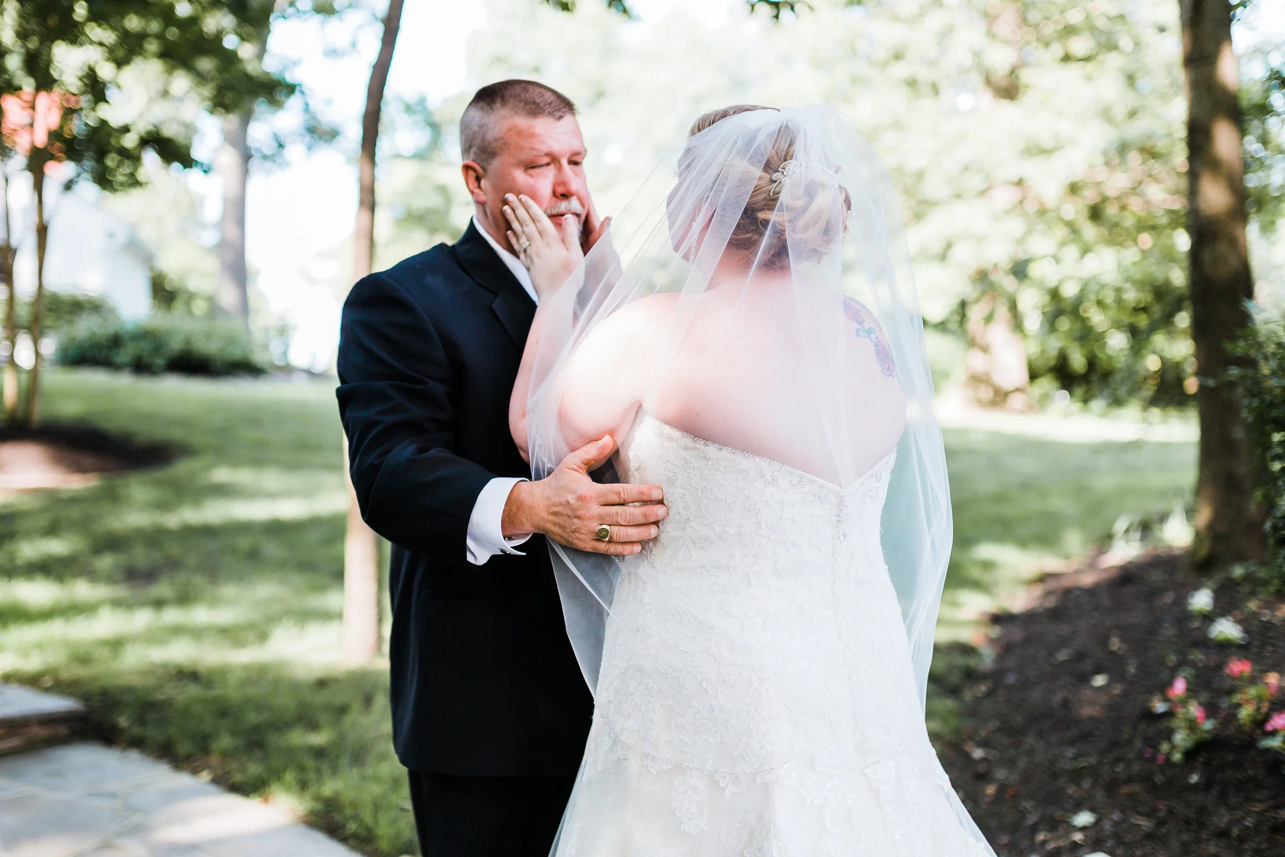 bride shares a first look with her father - maryland wedding - disney inspired wedding