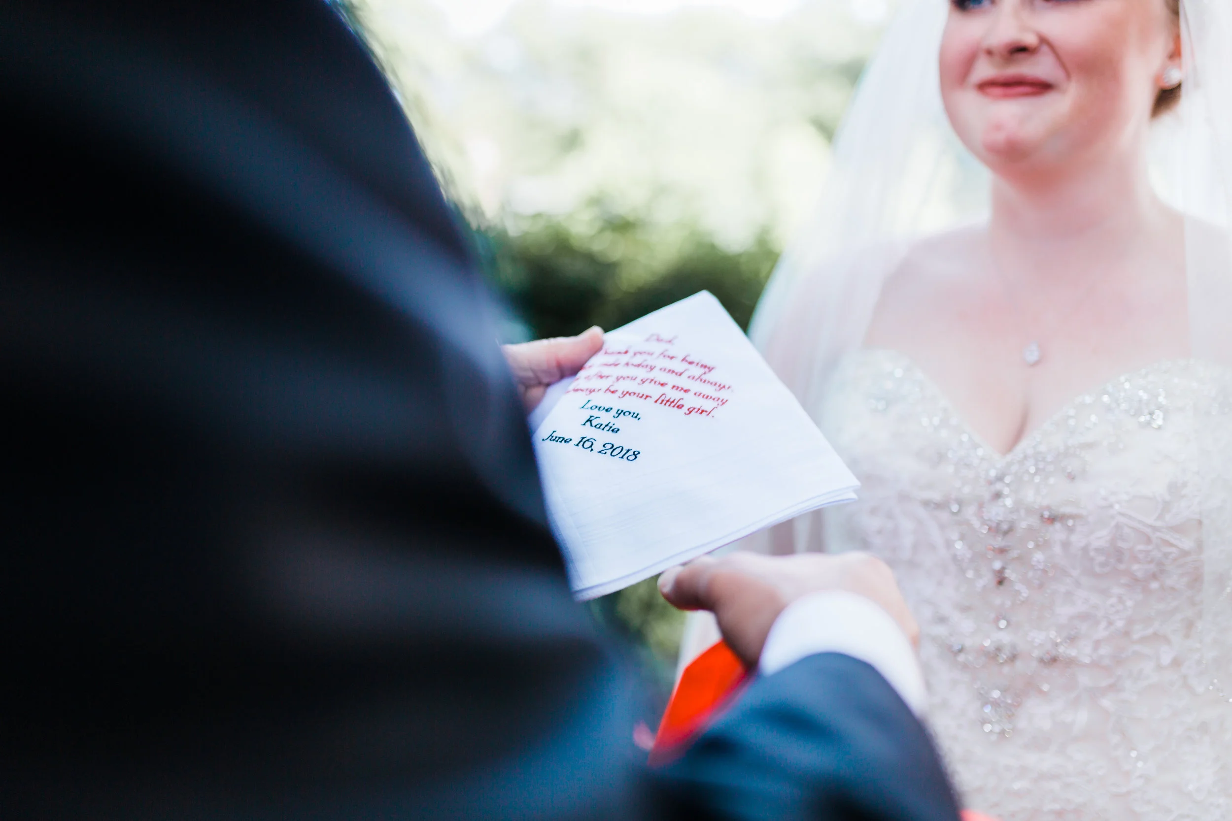 bride gives a gift to her father on her wedding day in pasadena, md - gift ideas to father of the bride - FOB - maryland wedding photographer