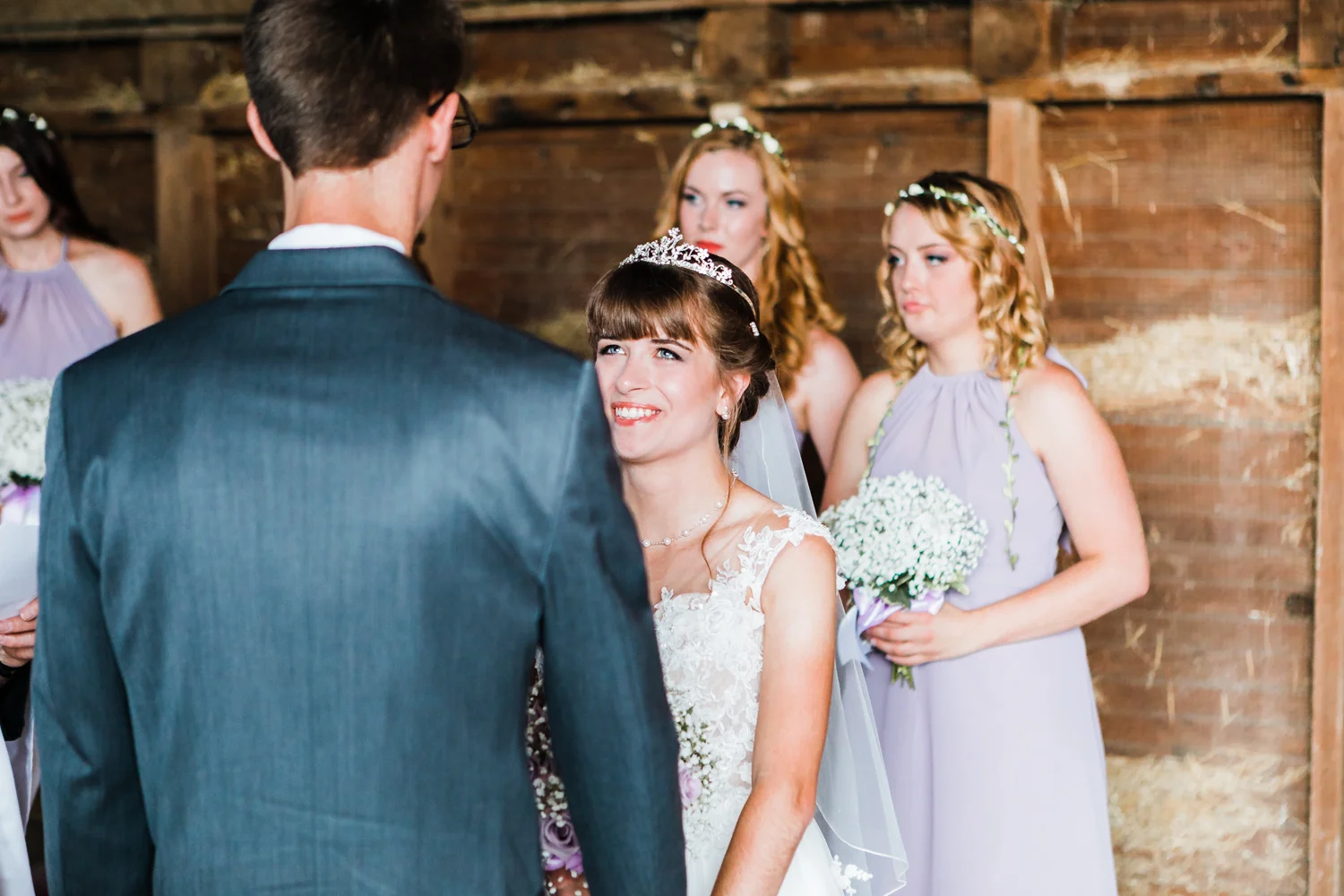 bride smiling at groom - rustic maryland wedding venues - best barn venues in maryland