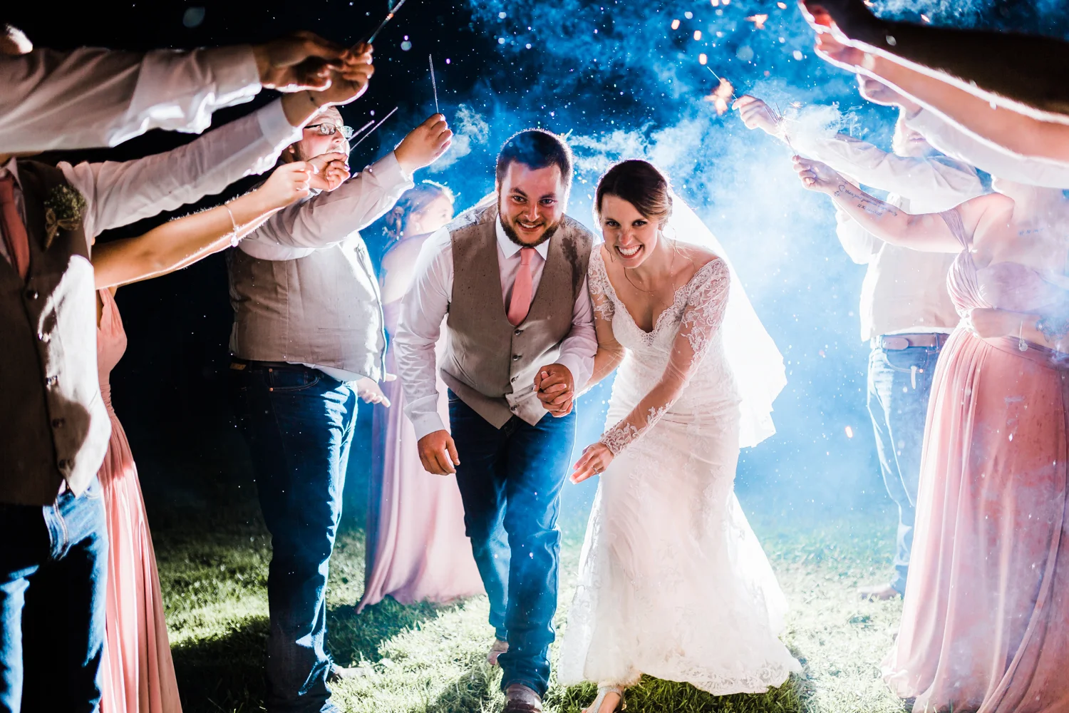 bride-groom-rainy-sparkler-exit.jpg