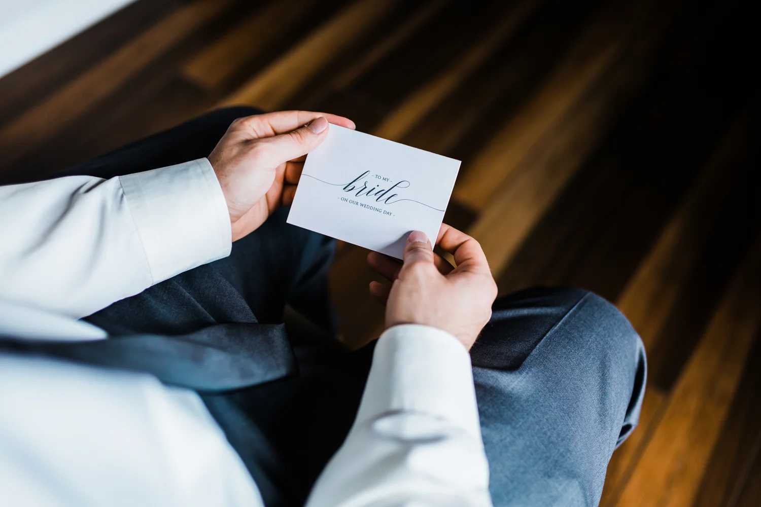 Groom reading his letter to his bride - Pond View Farm wedding - Maryland wedding photographer and cinematographer