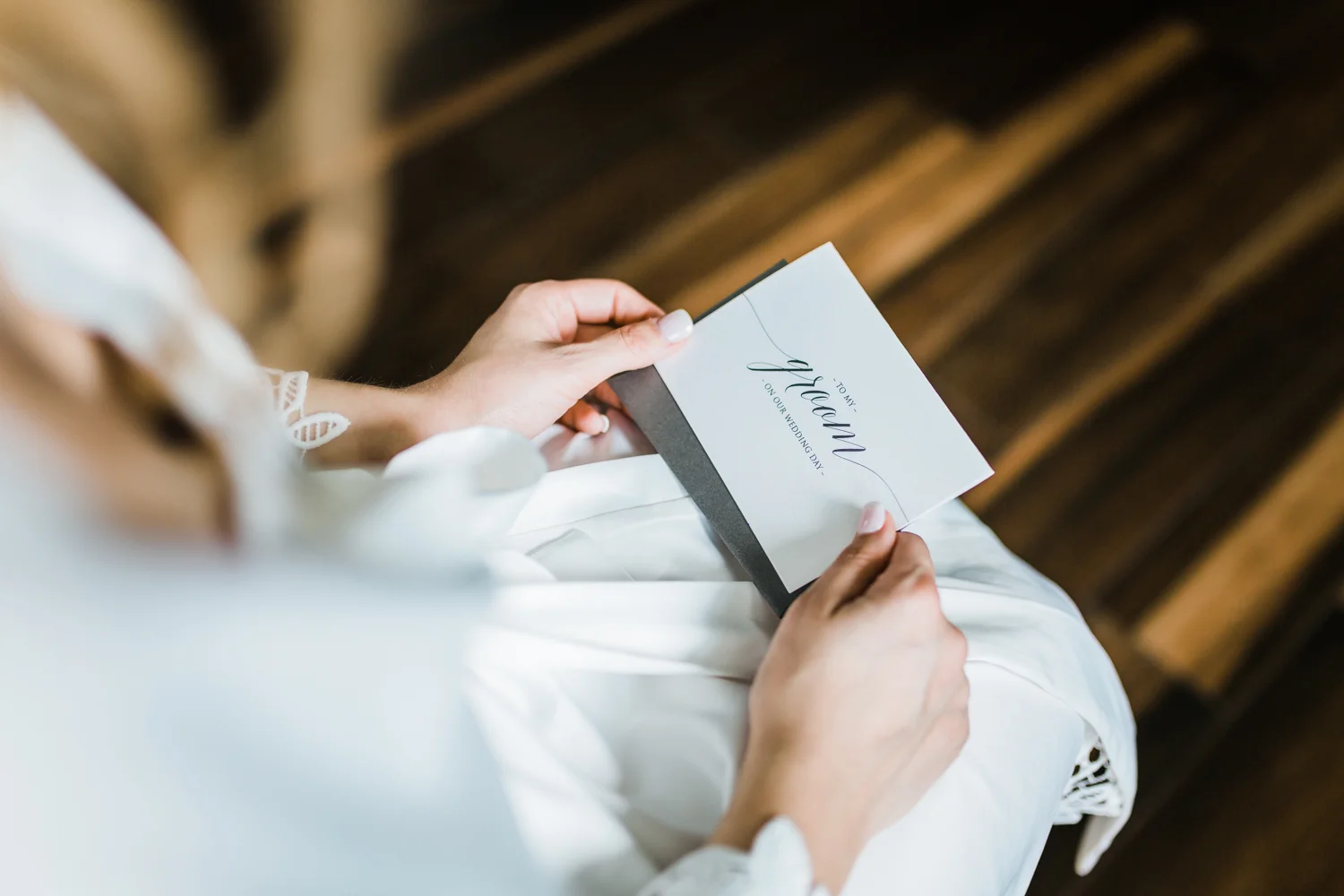bride reading her letter to her groom - Maryland wedding film - top rated md wedding cinematography / videography