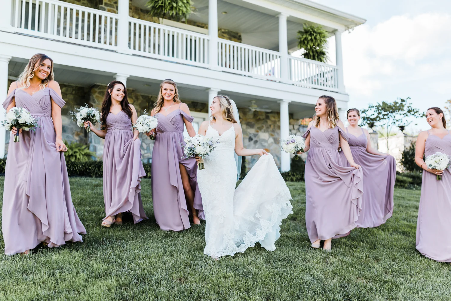 Bride walking and laughing with bridesmaids - Maryland