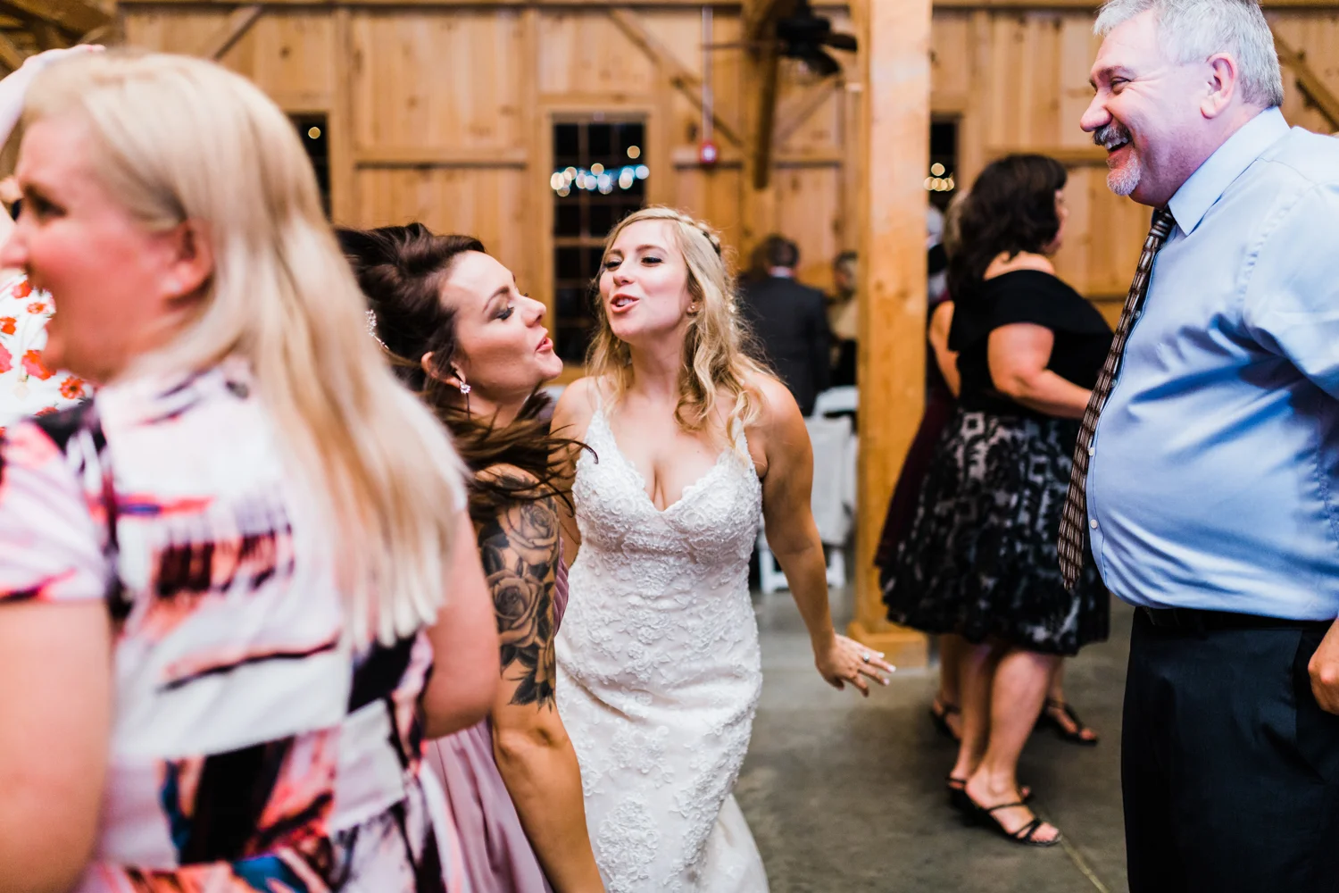 bride dancing with her best friend at Pond View Farm