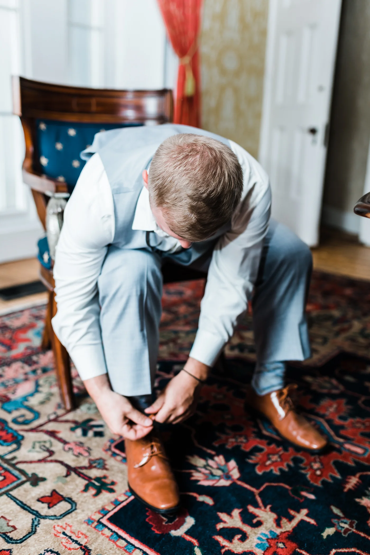Groom getting ready - classy wedding venues in Maryland Antrim 1844 - best wedding photographer in MD