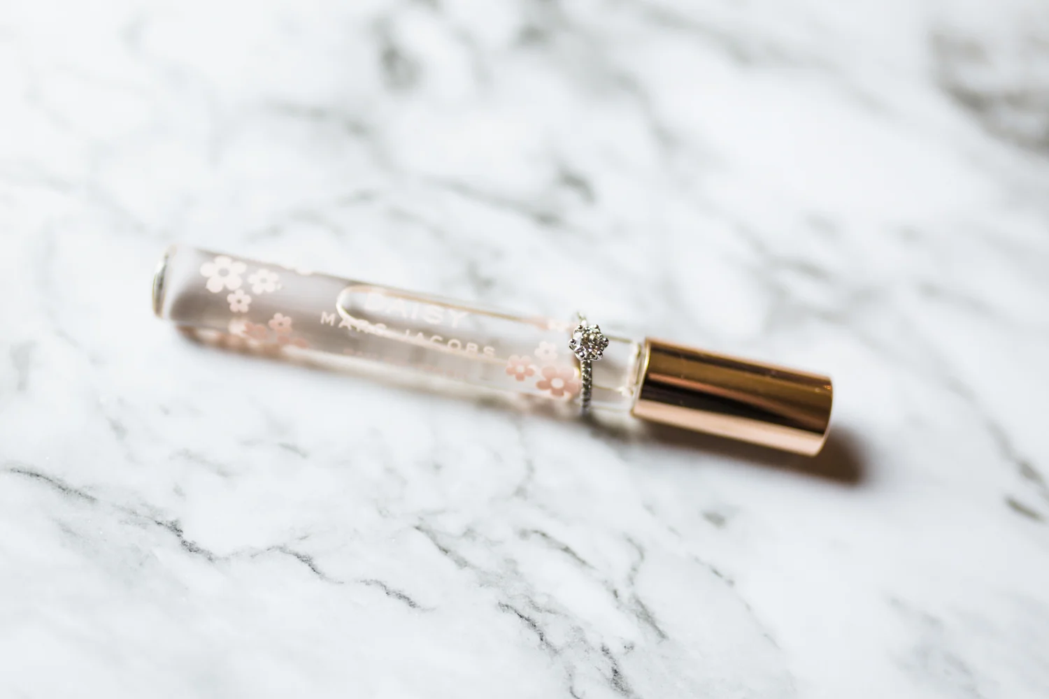 bride Marc Jacobs Daisy perfume with ring - highly rated photography team in Maryland