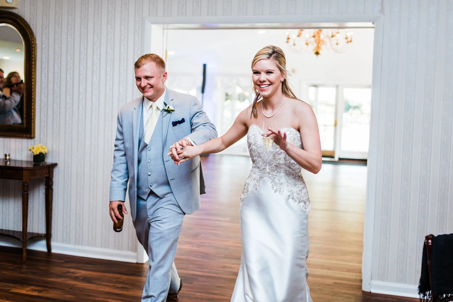 bride and groom come in to their reception at Antrim 1844 in Carroll County, MD
