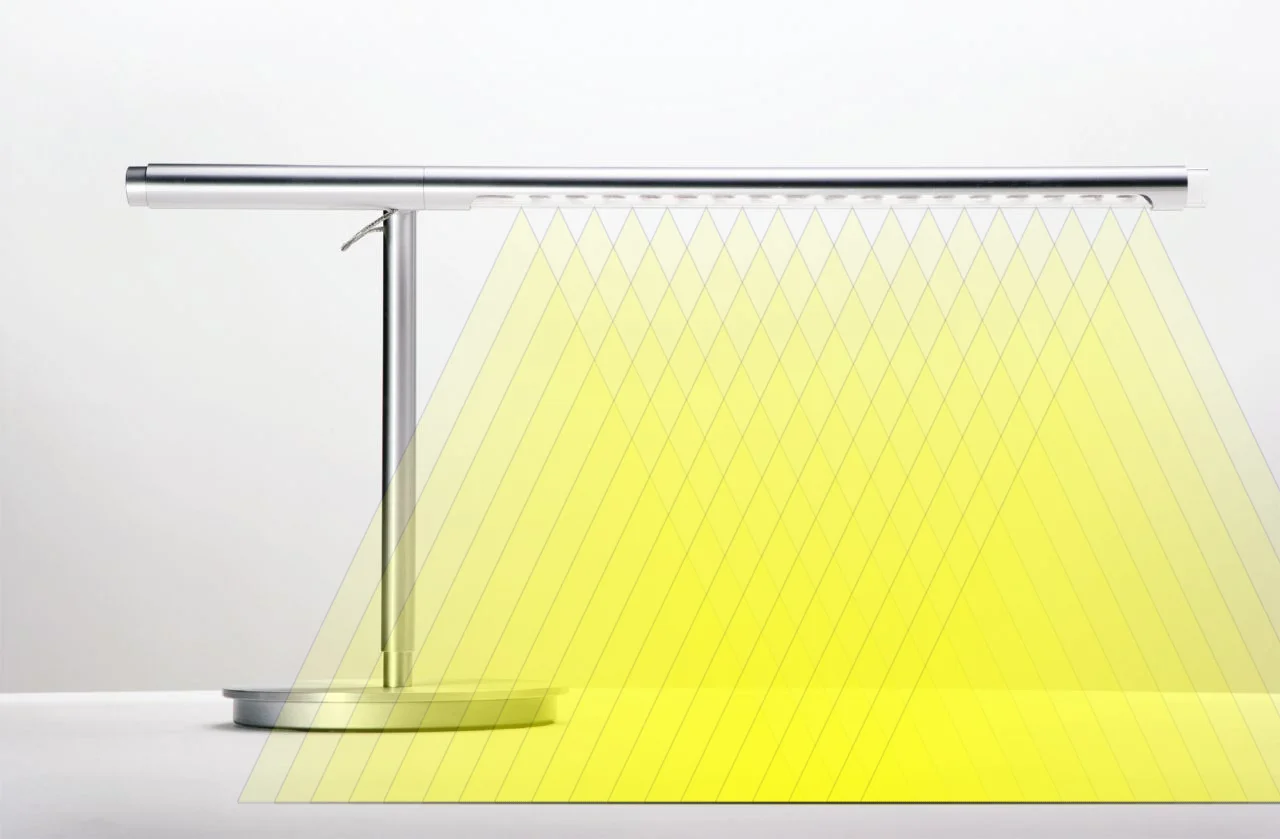 The $440 Pablo Design / Haworth BRAZO Lamp is an example of an Array LED lamp. Illustrated here to show you how the 18 LED singlefile array creates 18 shadows.