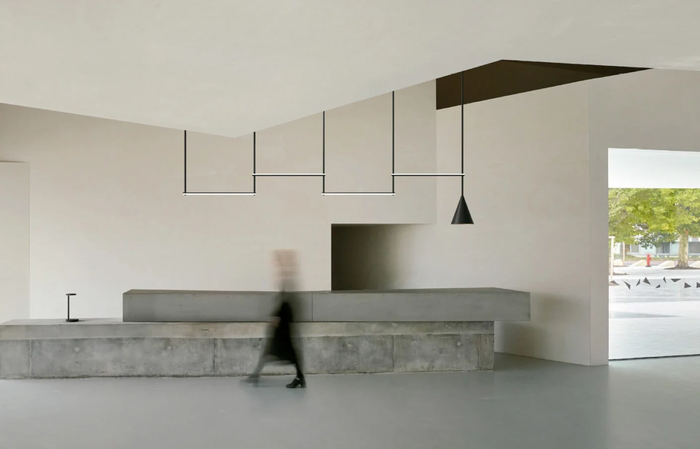 Infra-Structure Episode 2 lighting system and Oblique table luminaire for Flos