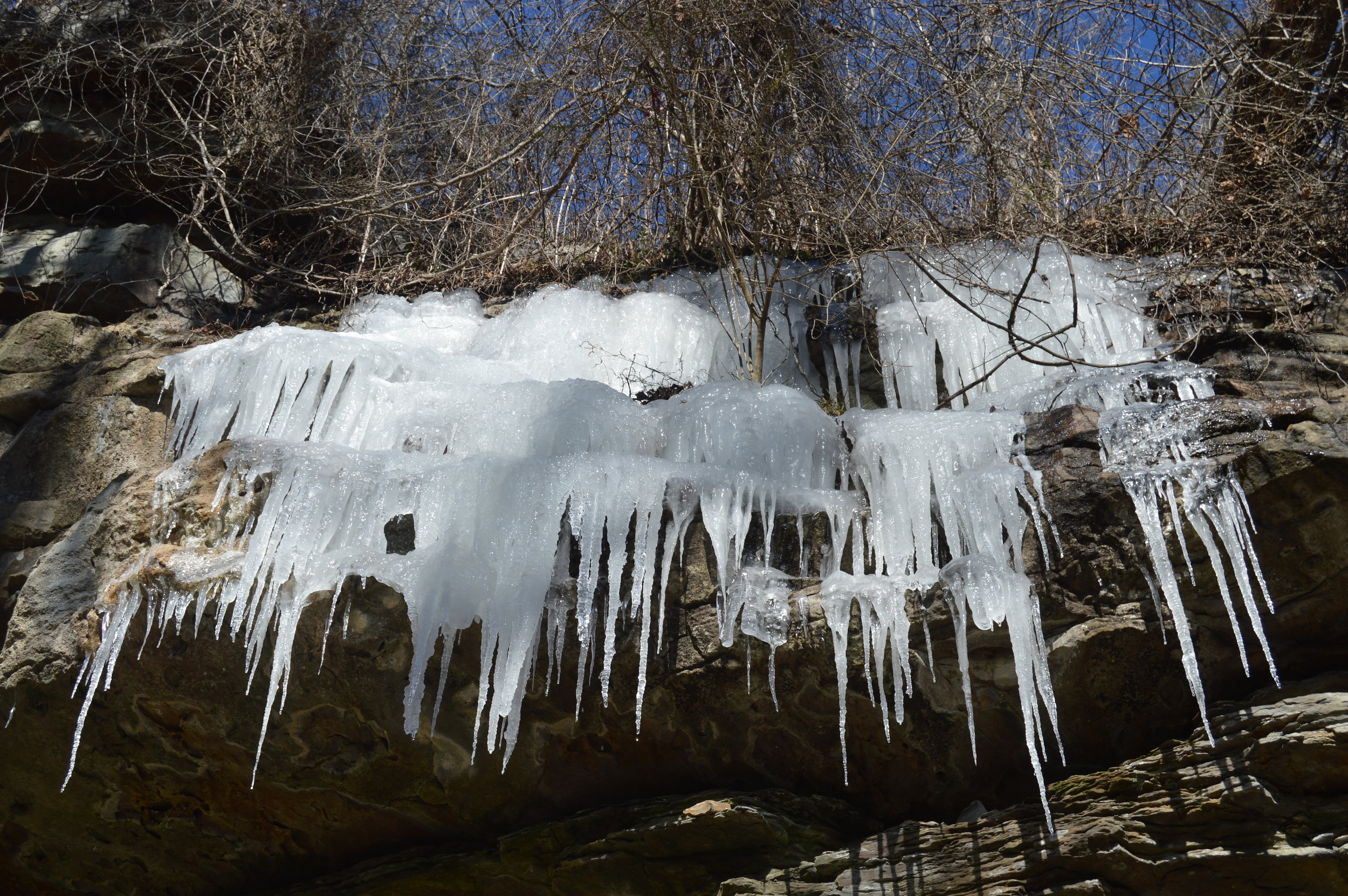  The rock ledges on the trail down to the base of Ozone Falls covered in a wide array of icicles. 