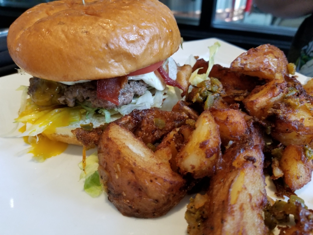  On weekends, Stawberry Alley Ale Works serves up a juicy breakfast burger topped with a fried egg.  