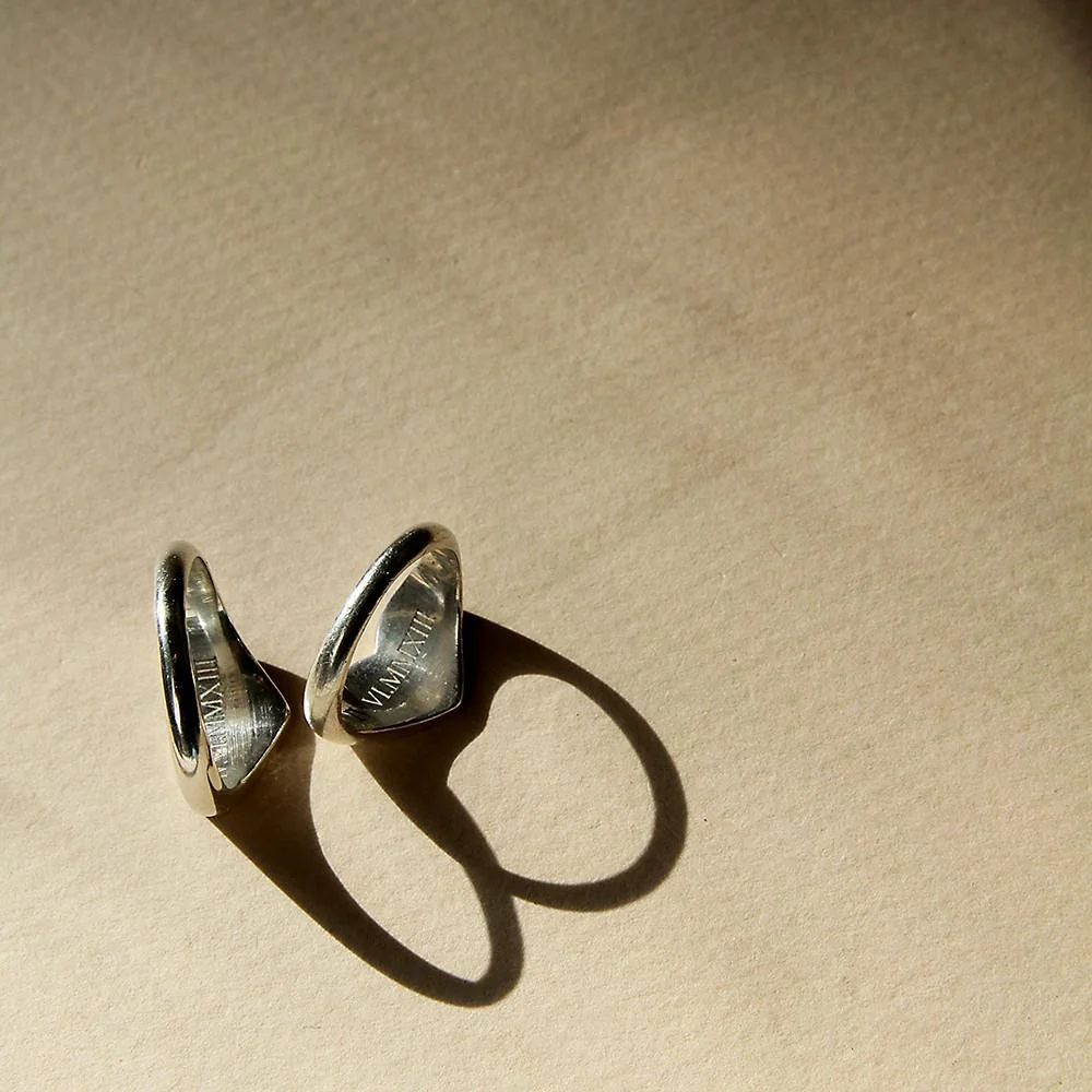 The heart signets, like all our rings, are engraveable on the inside, for those important dates. Here I engraved the Date that Stella and I first started working together as a unison. 