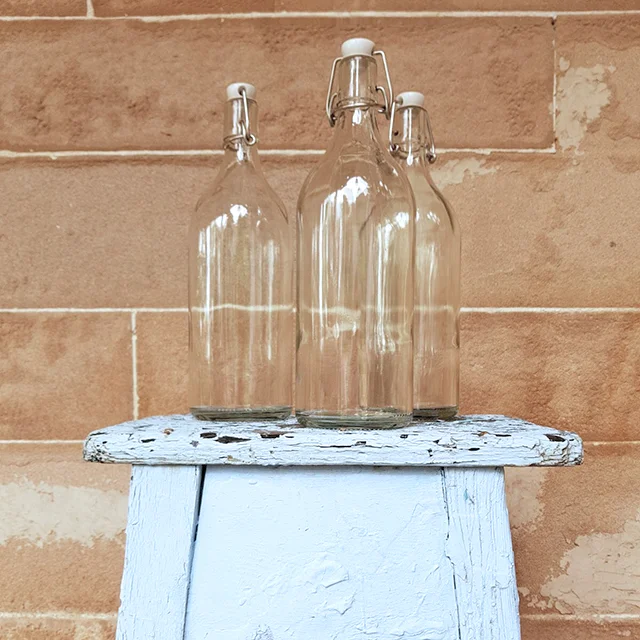 Glass clip top bottle candle holders