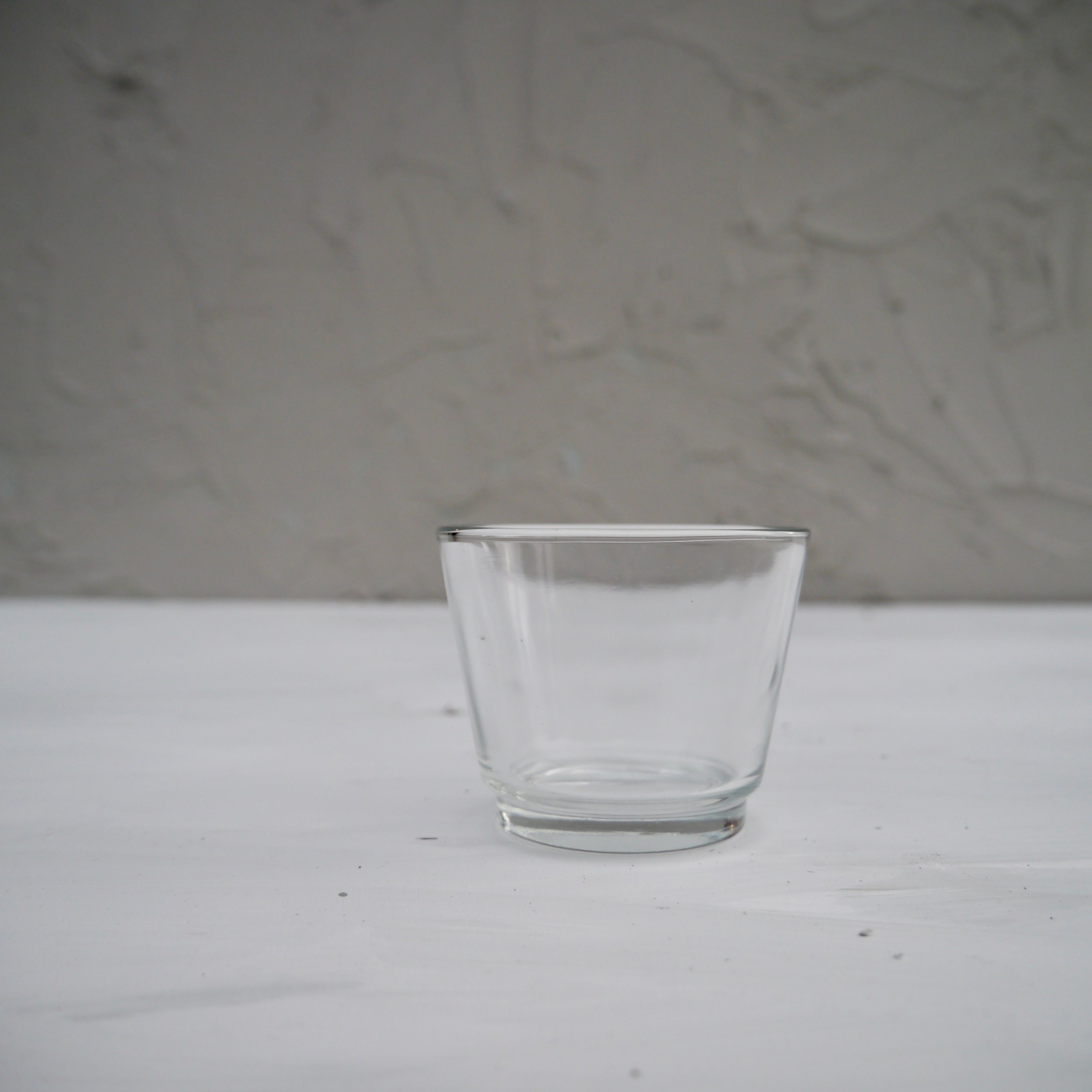 Glass tea light holders