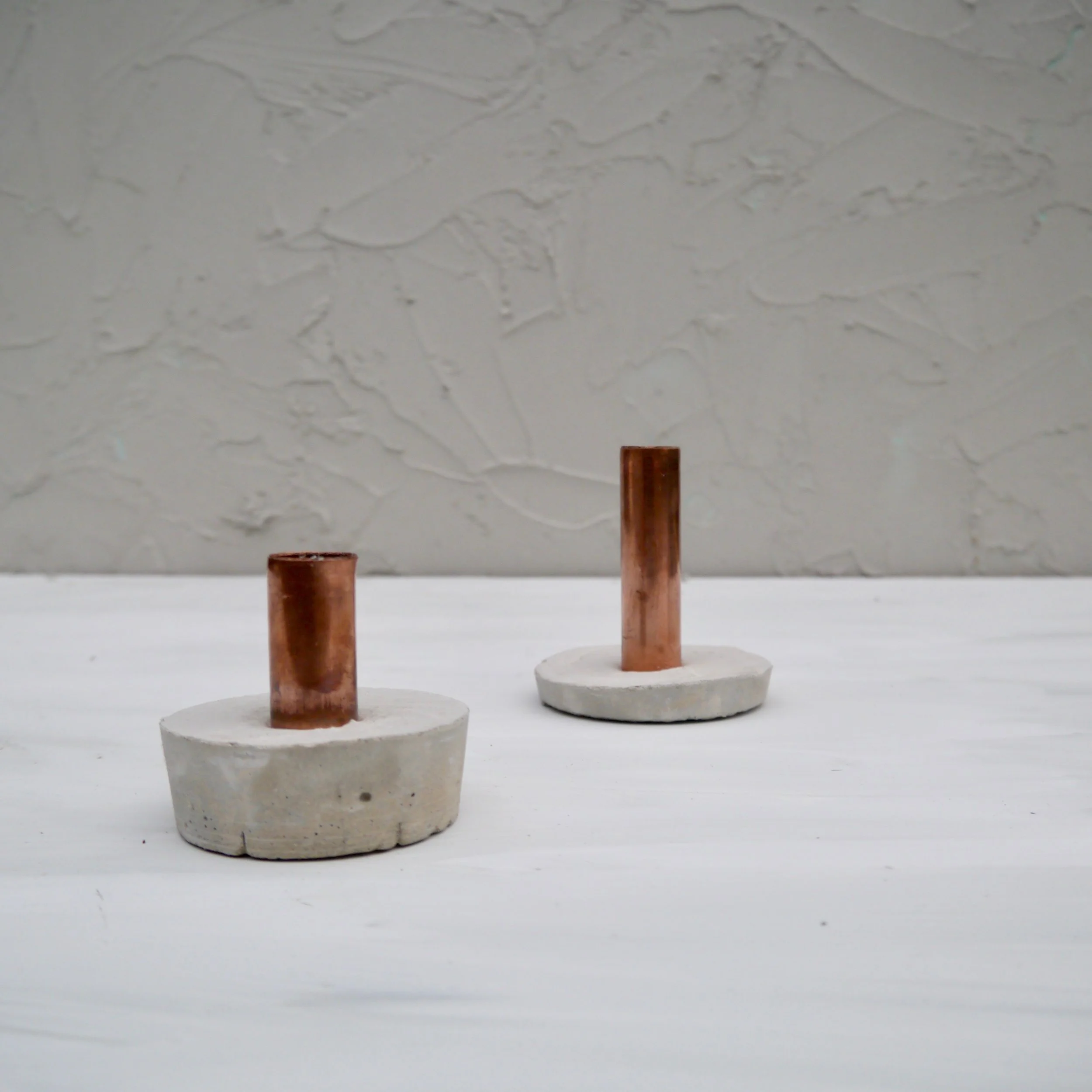 Concrete and copper candlesticks