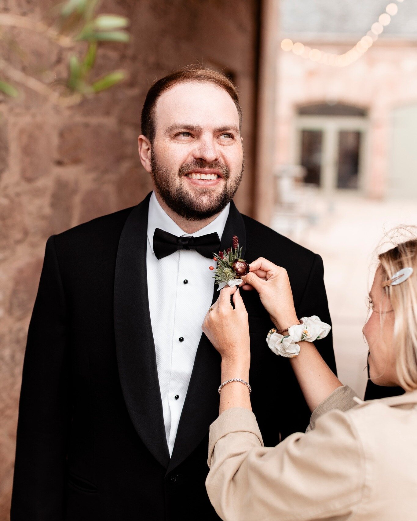 A moment for the boys in bowties, who are just as deserving of gorgeous wedding flowers as the girls. We love Nicole's bridesman who chose a pocket piece rather than a standard buttonhole. We're around on the morning of your wedding to help with the 