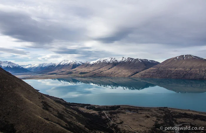 Lake Ohau with the Ohau Resort Lodge on the close side of the lake, viewed from the resort access road