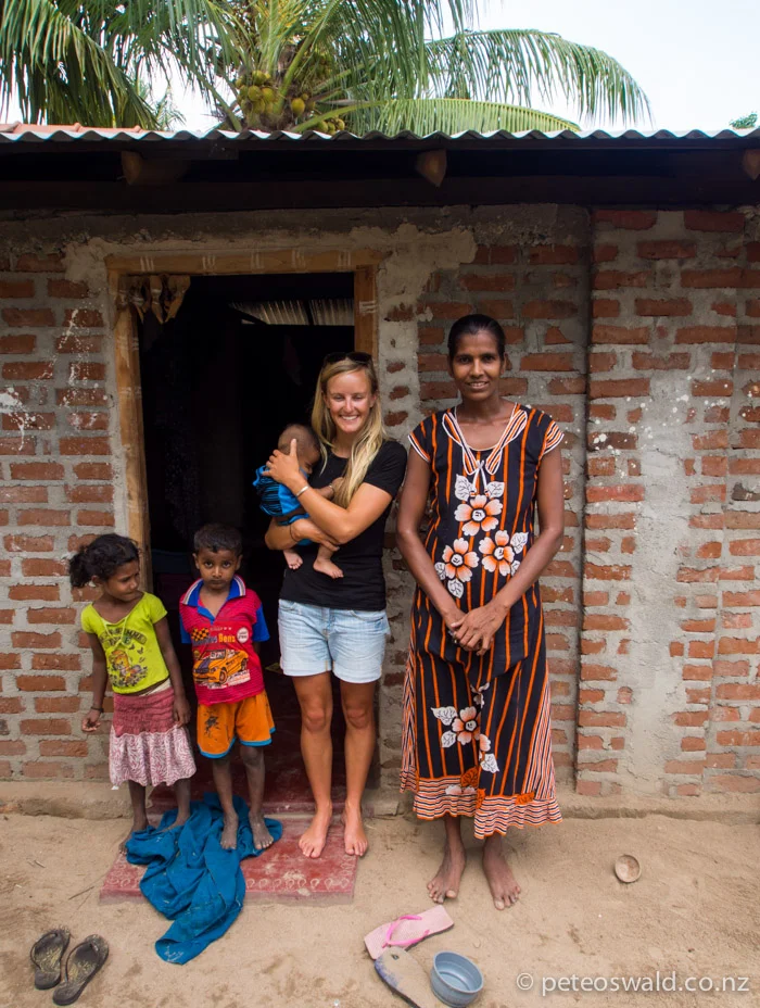 Soph with one of the Families that live near by, very proud people and happy with very few material things