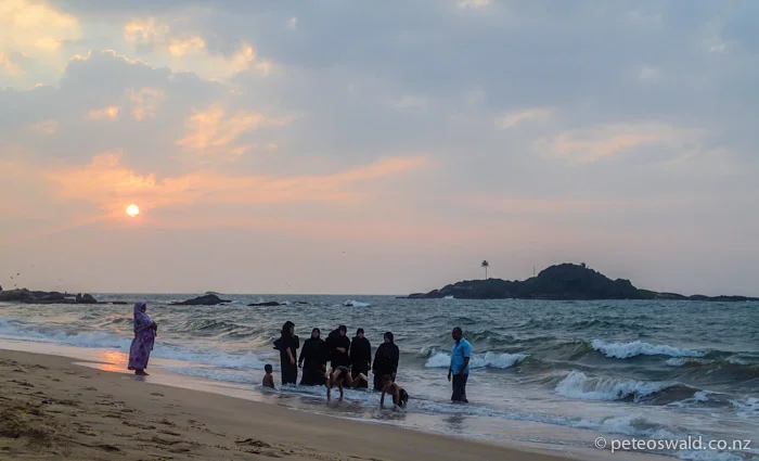 A Muslim with what we assumed to be his Harem on the beach at Beruwala