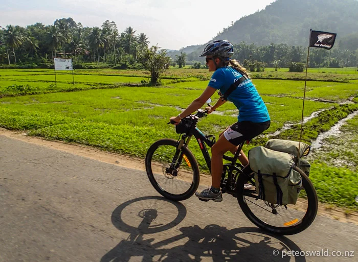 Back on the road cruising past rice paddies